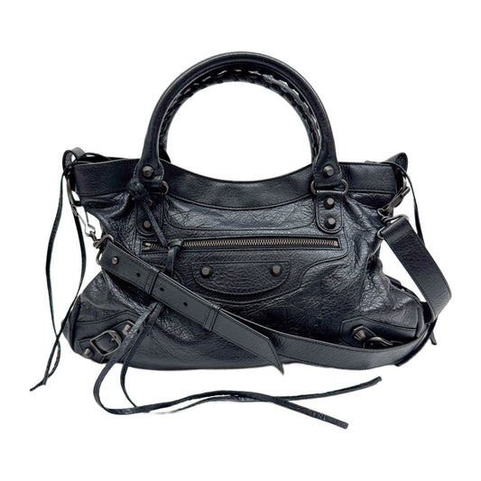 The First Black Leather Handle Bag