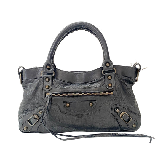 The First Black Leather Handlebag