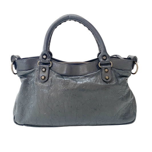 The First Black Leather Handlebag