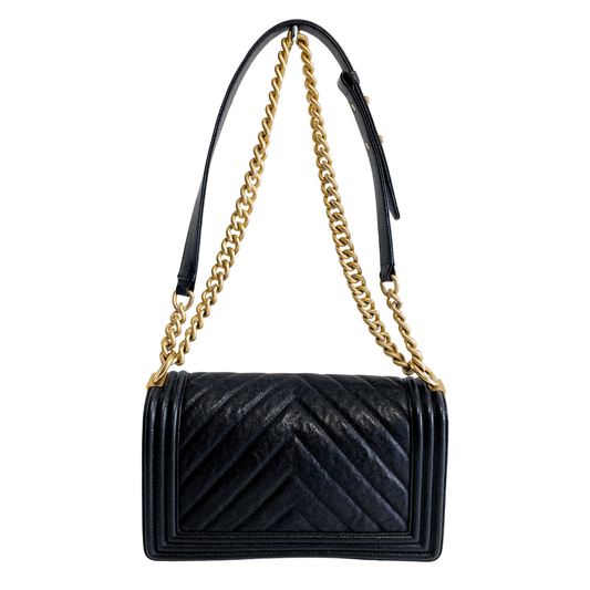 CHANEL Boy V Stitched Chevron Black Leather Gold Chain Shoulder Bag, in , Sold by HIVE PRELOVED - Crossbody bags Shoulder Bag