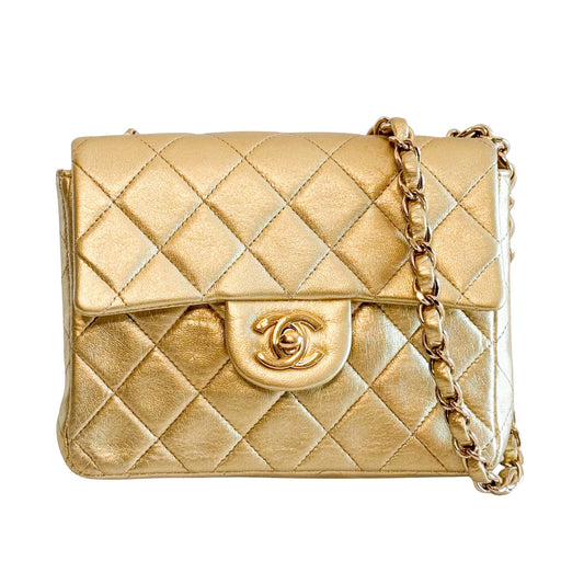 CHANEL Classic Flap Gold Lambskin Mini Gold Chain Shoulder Bag, in , Sold by HIVE PRELOVED - Crossbody bags, ,