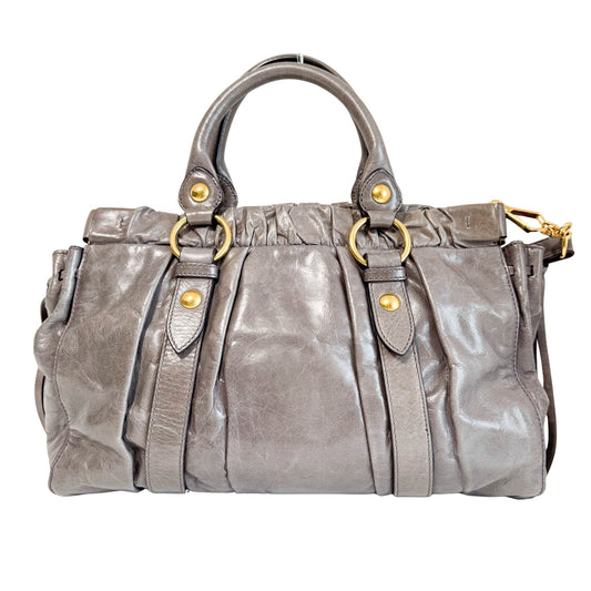 MIU MIU Vitello Bauletto Leather Handbag Grey, in , Sold by HIVE PRELOVED - Crossbody bags, Handle Bags,