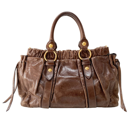 MIU MIU Vitello Brown Leather Top Handle Bag, in , Sold by HIVE PRELOVED - Crossbody bags, Handle Bags,