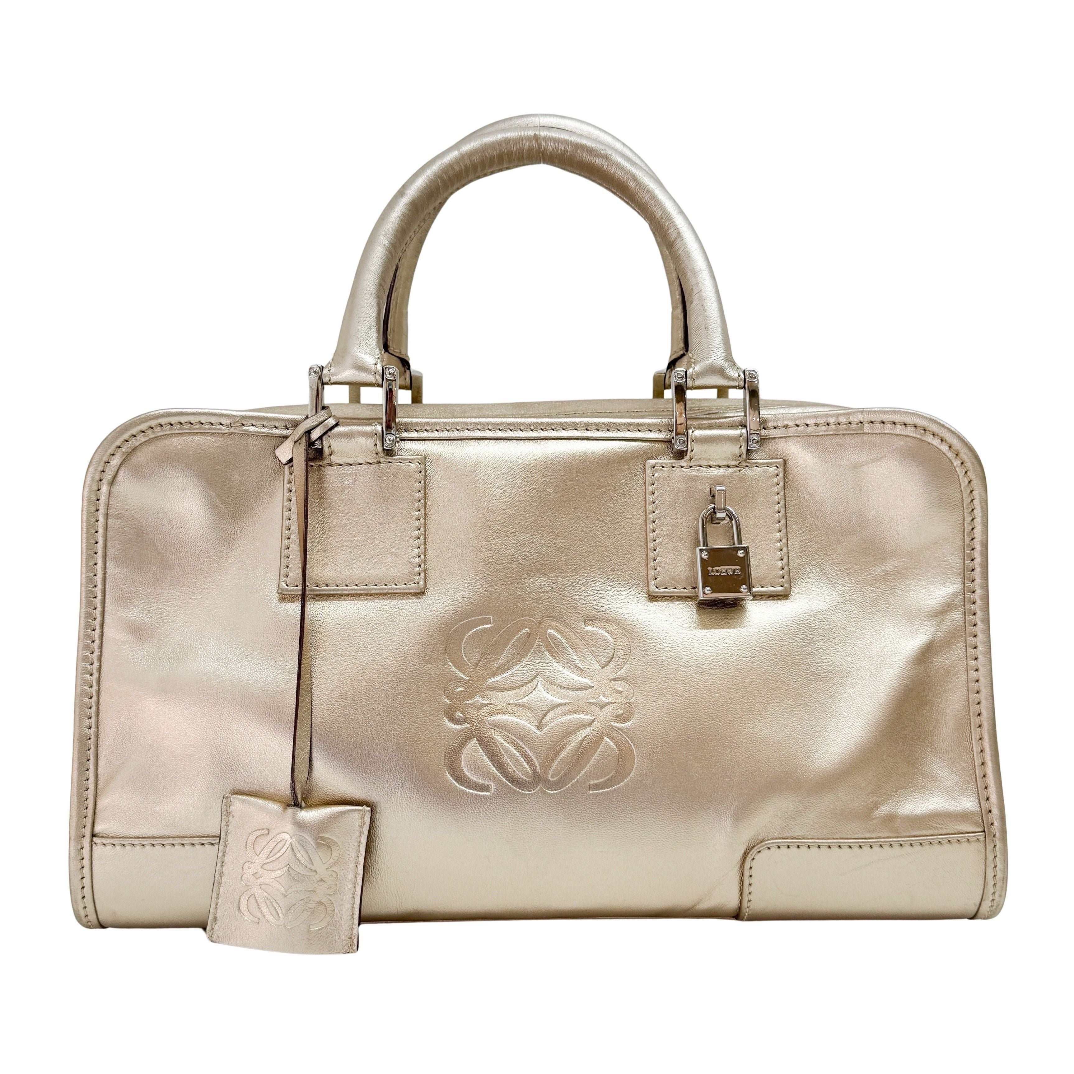 Anagram Gold Leather Hand Bag
