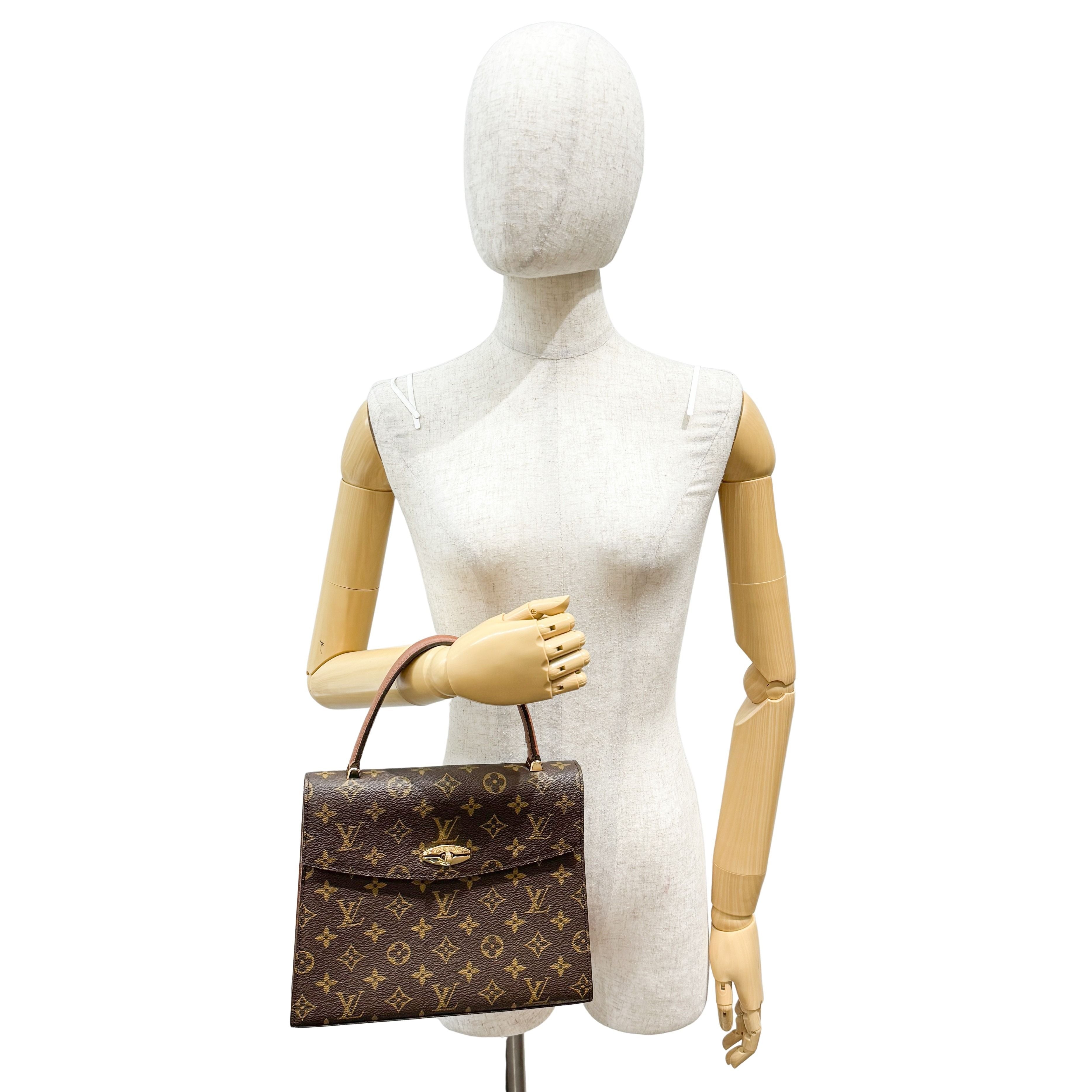 Malesherbes Brown Monogram Hand Bag