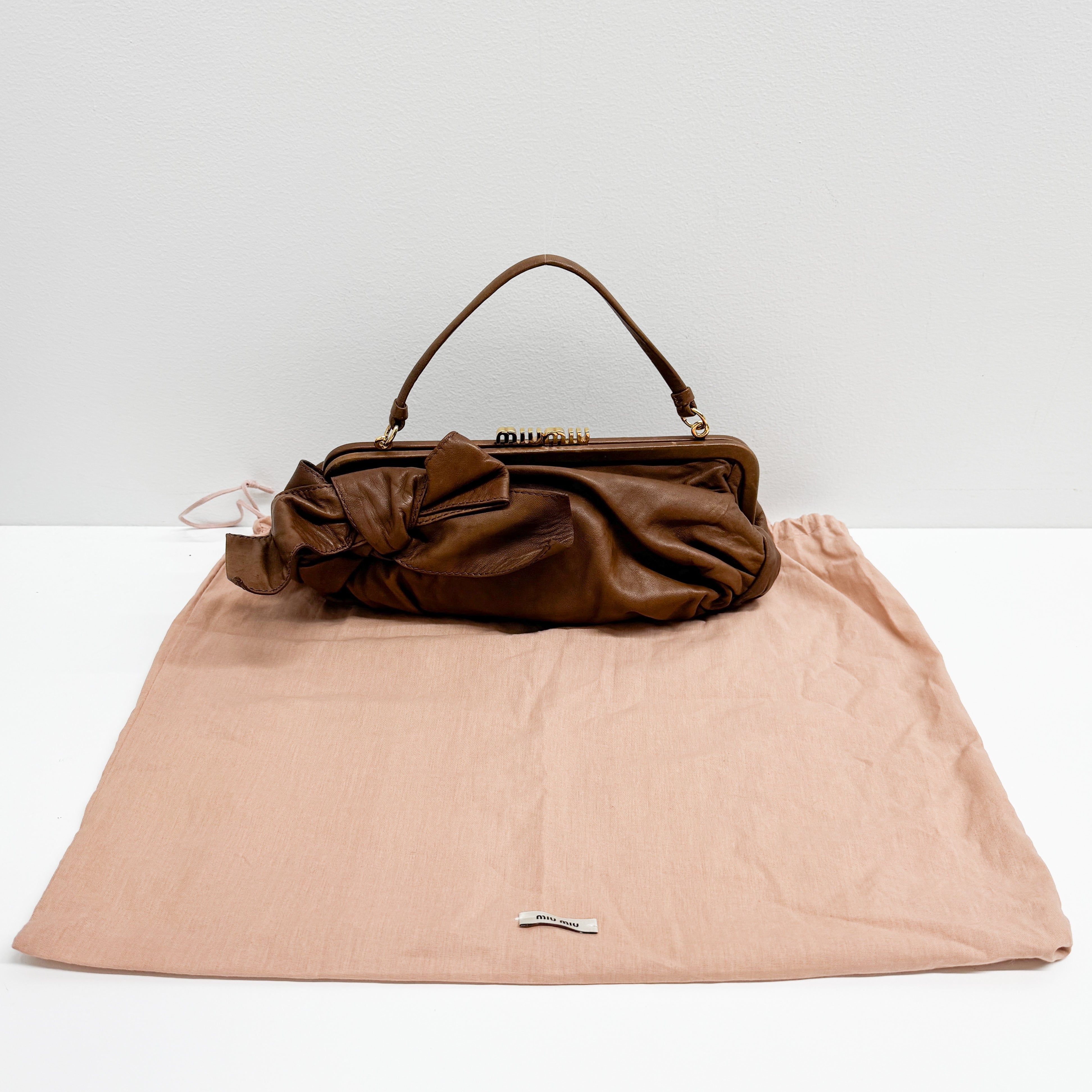 Bow Brown Leather Clutch/Hand Bag