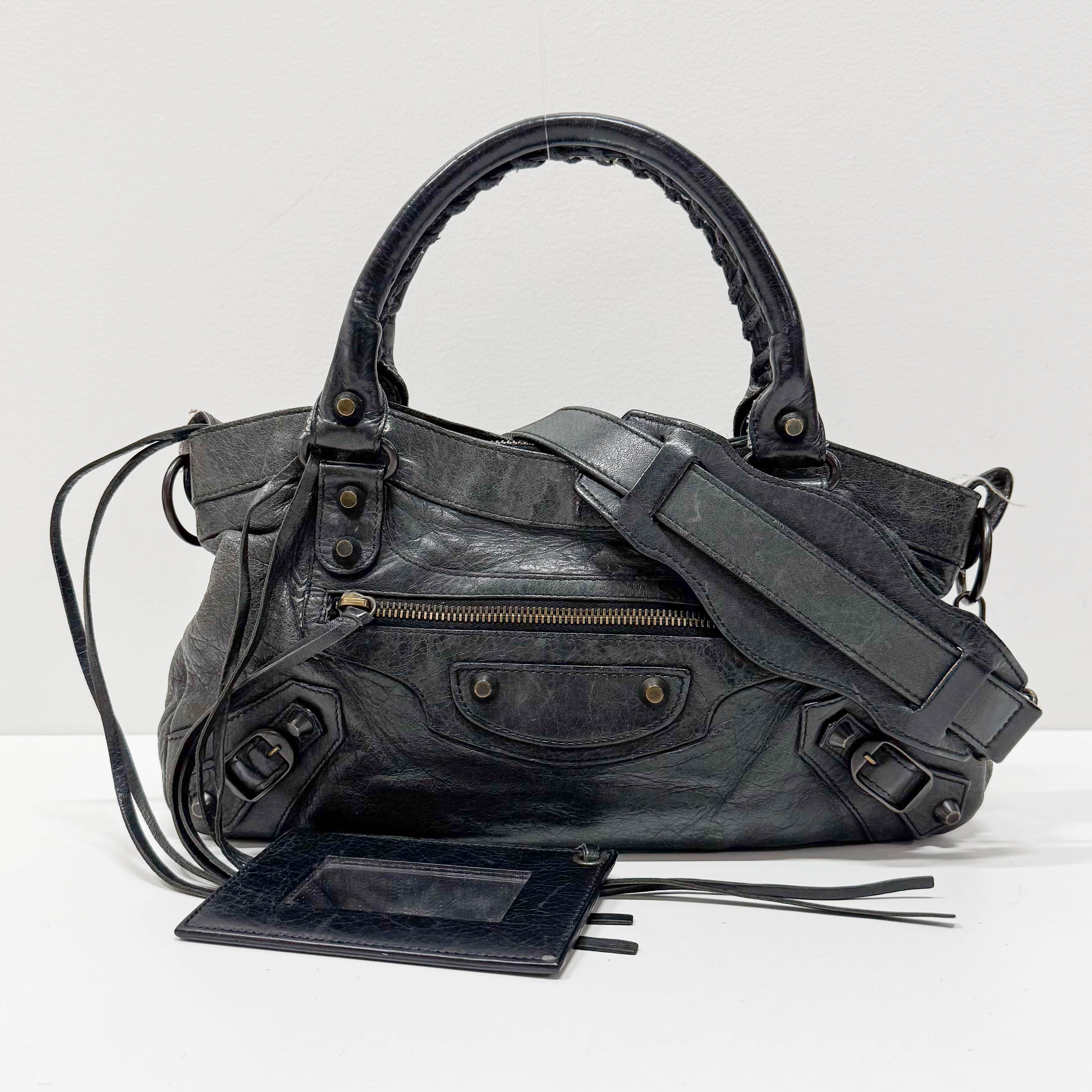 The First Black Calfskin Leather Handlebag