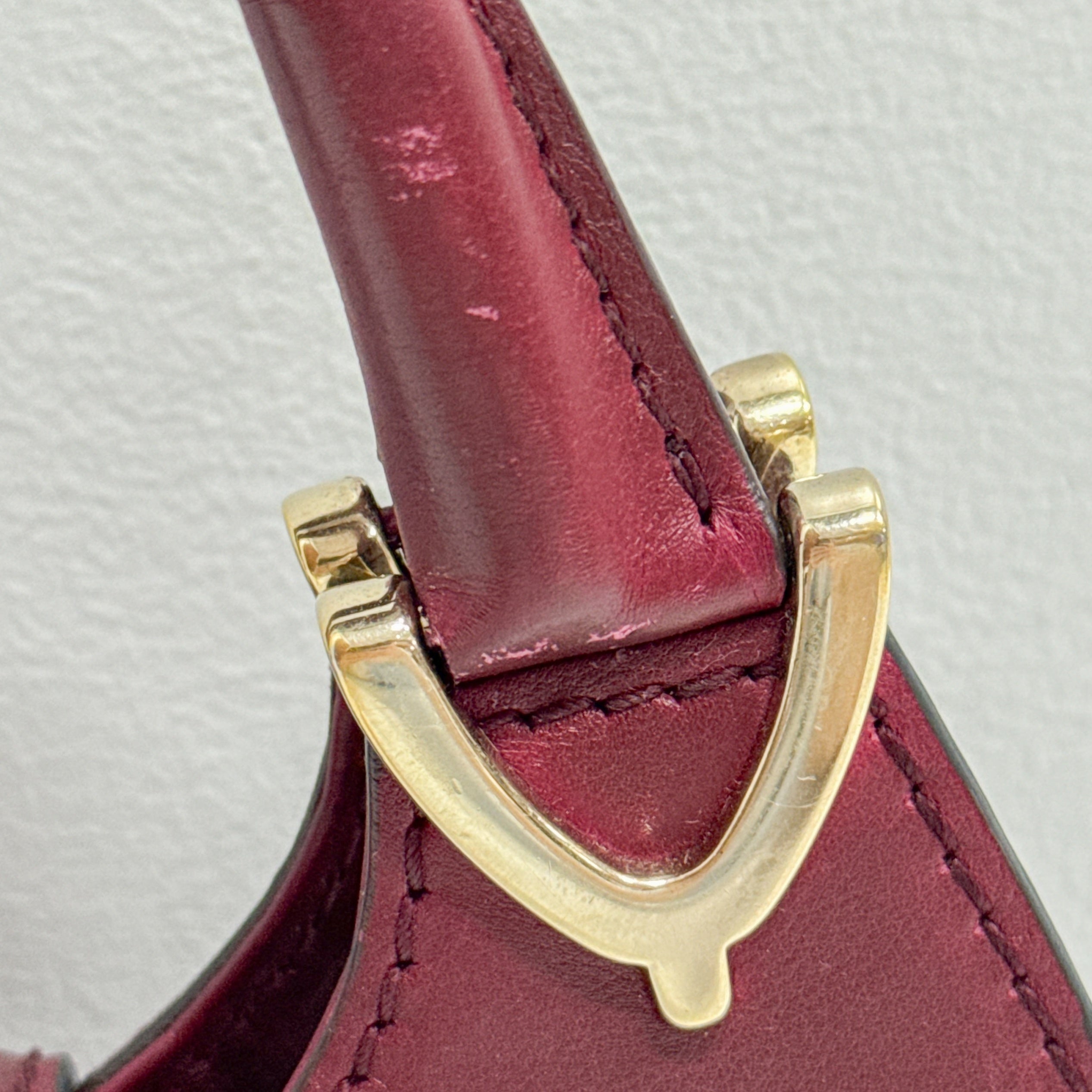 Stirrup Burgundy Leather Handbag