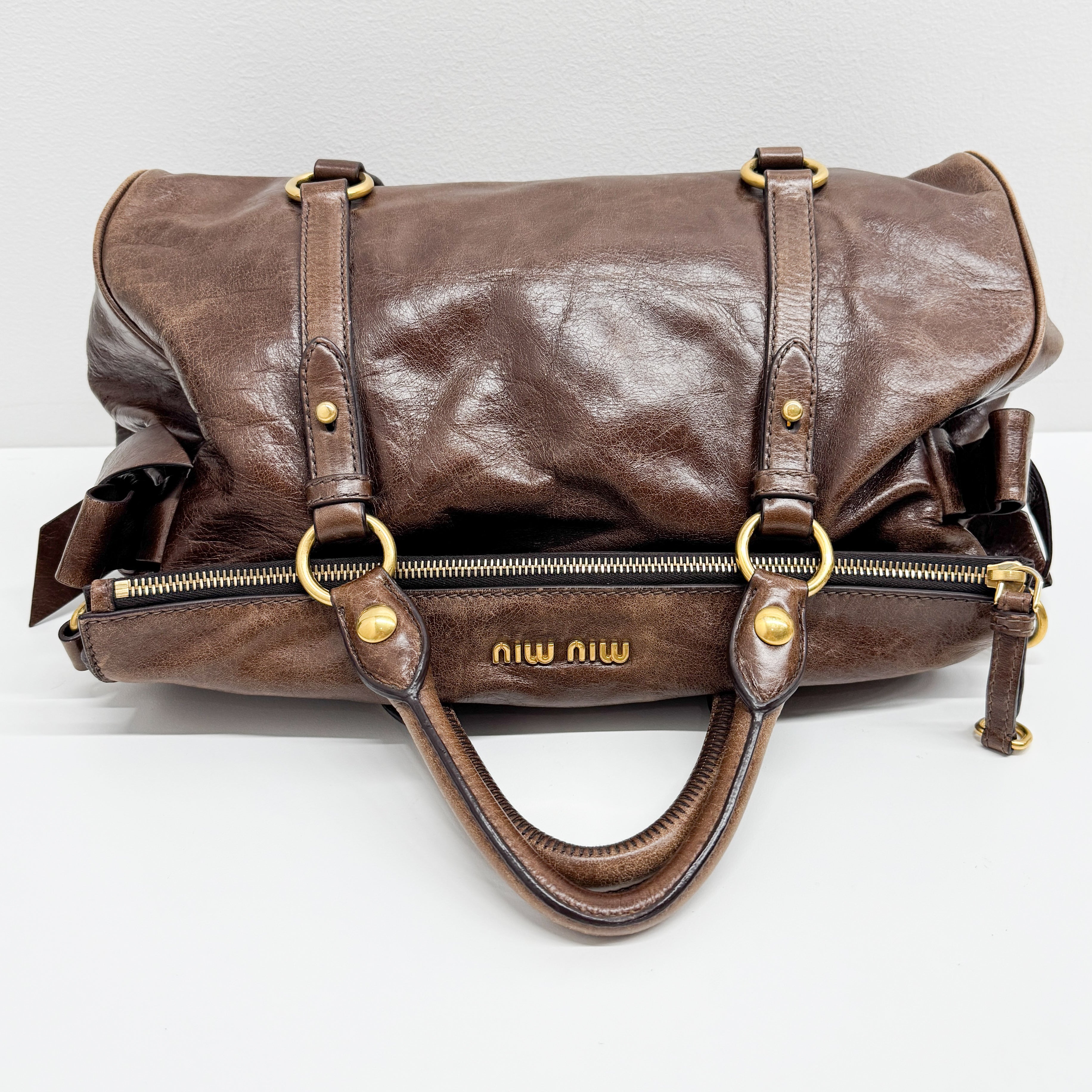 Vitello Lux Bow Brown Calfskin Leather Hand Bag