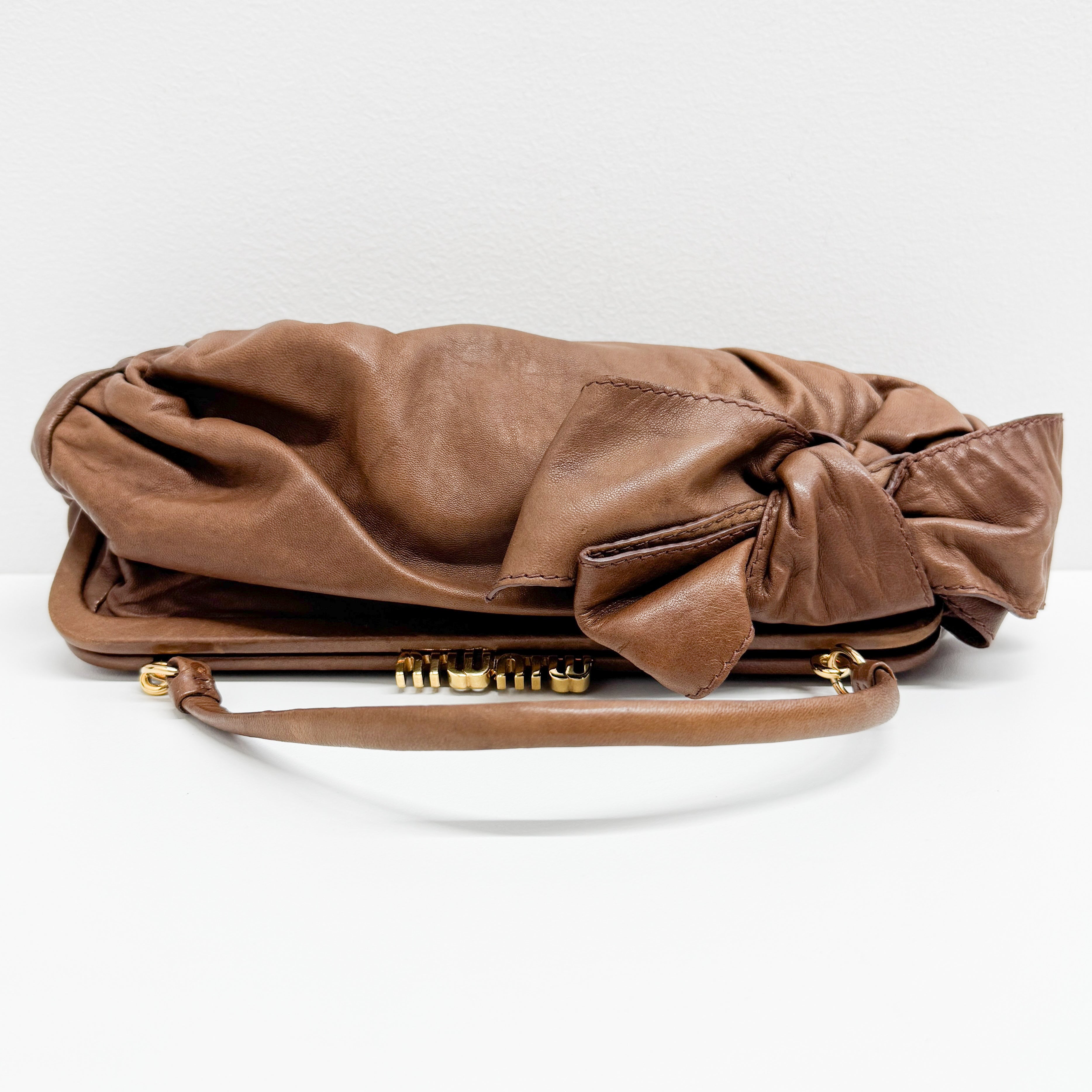 Bow Brown Leather Clutch/Hand Bag