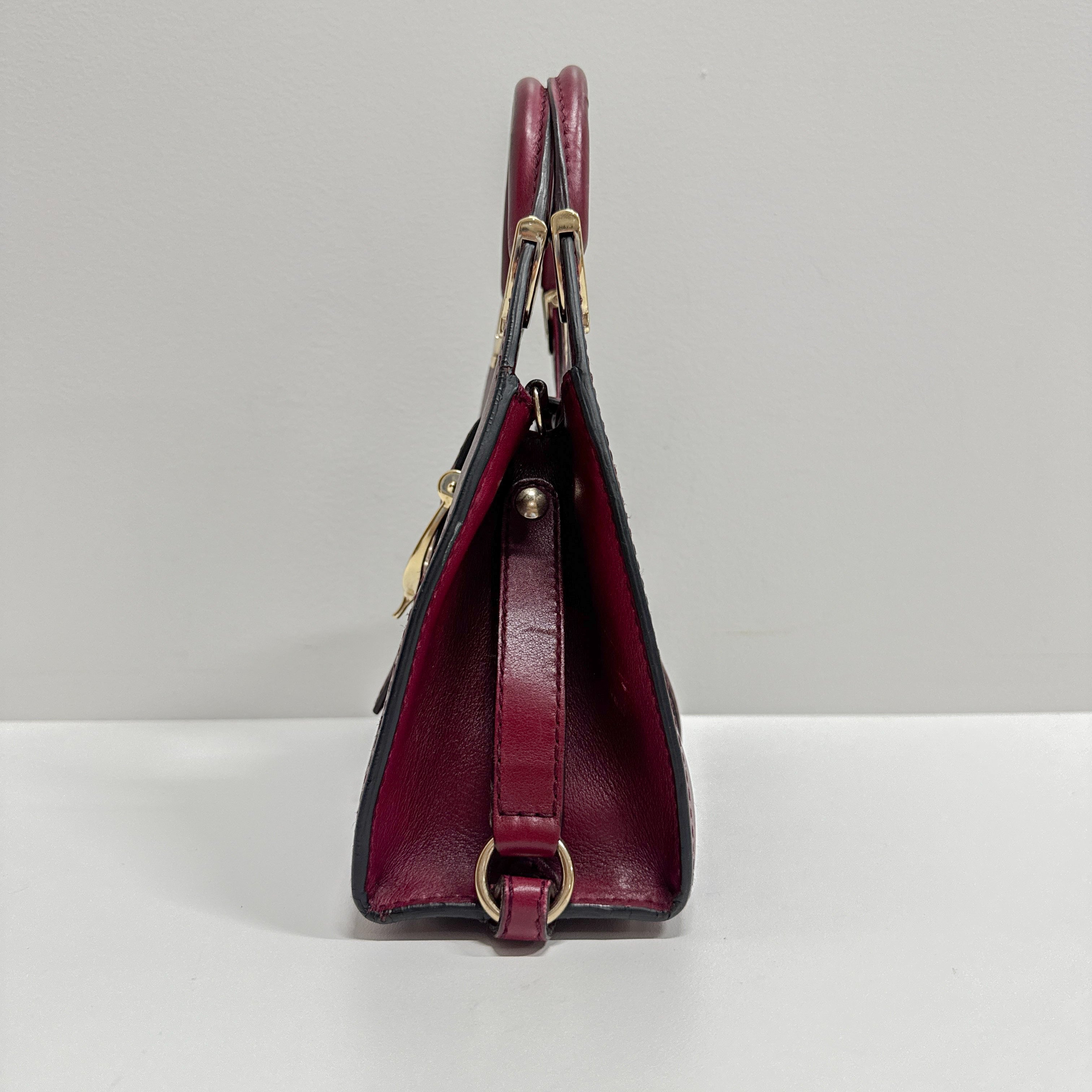 Stirrup Burgundy Leather Handbag