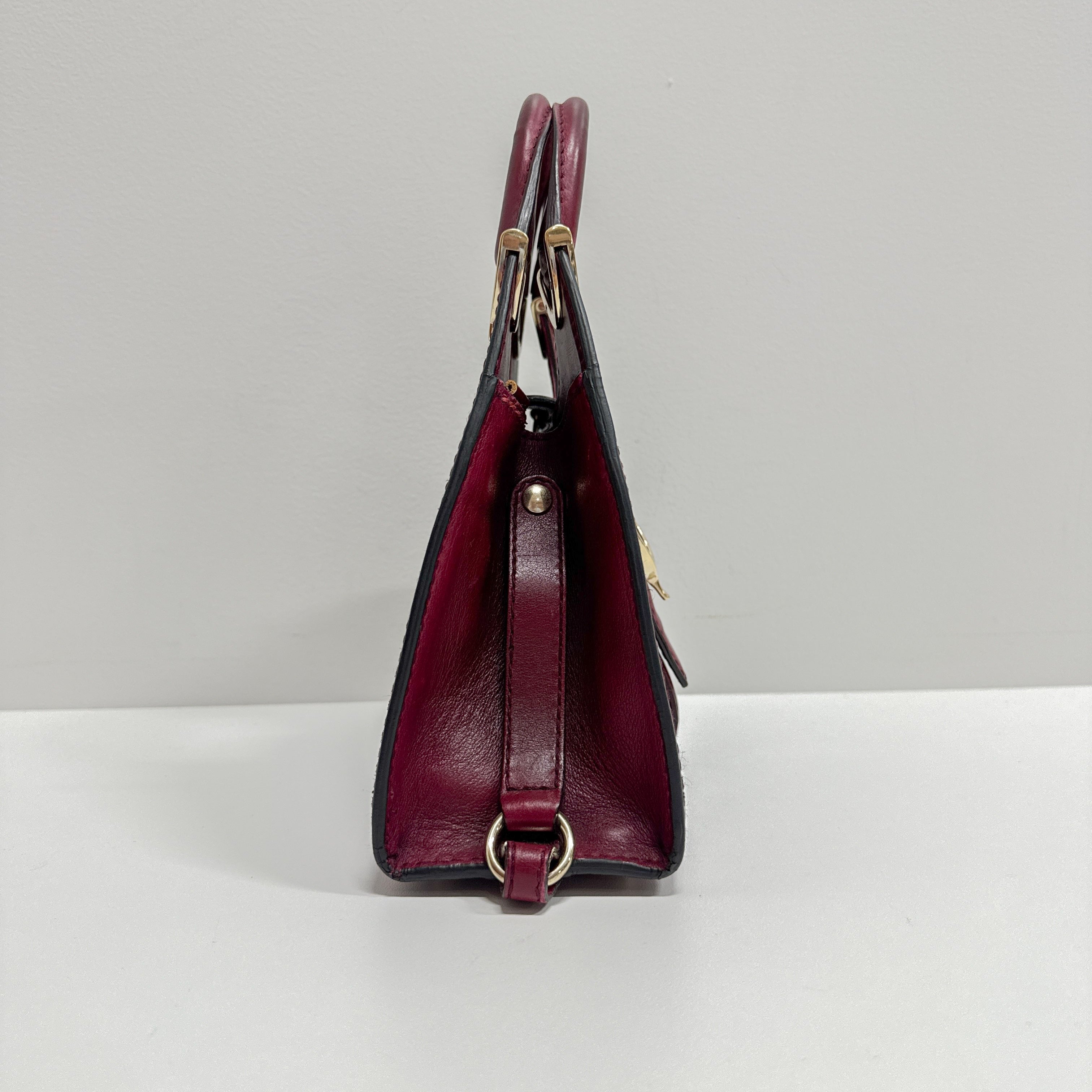 Stirrup Burgundy Leather Handbag