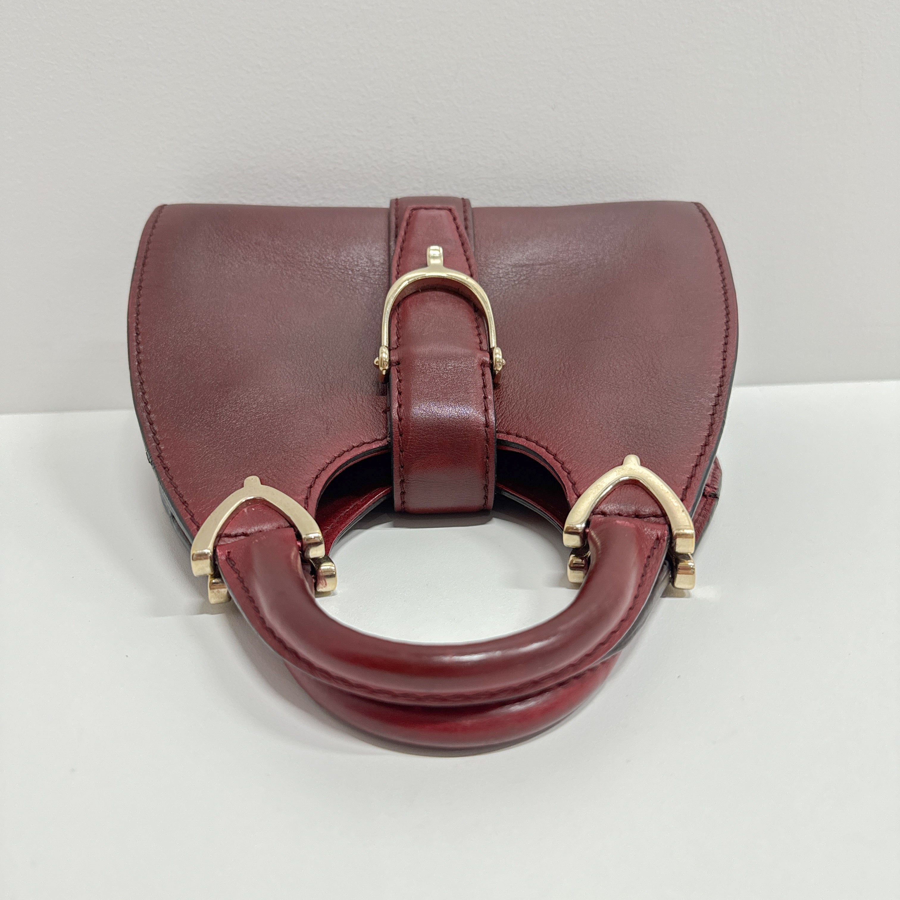 Stirrup Burgundy Leather Handbag
