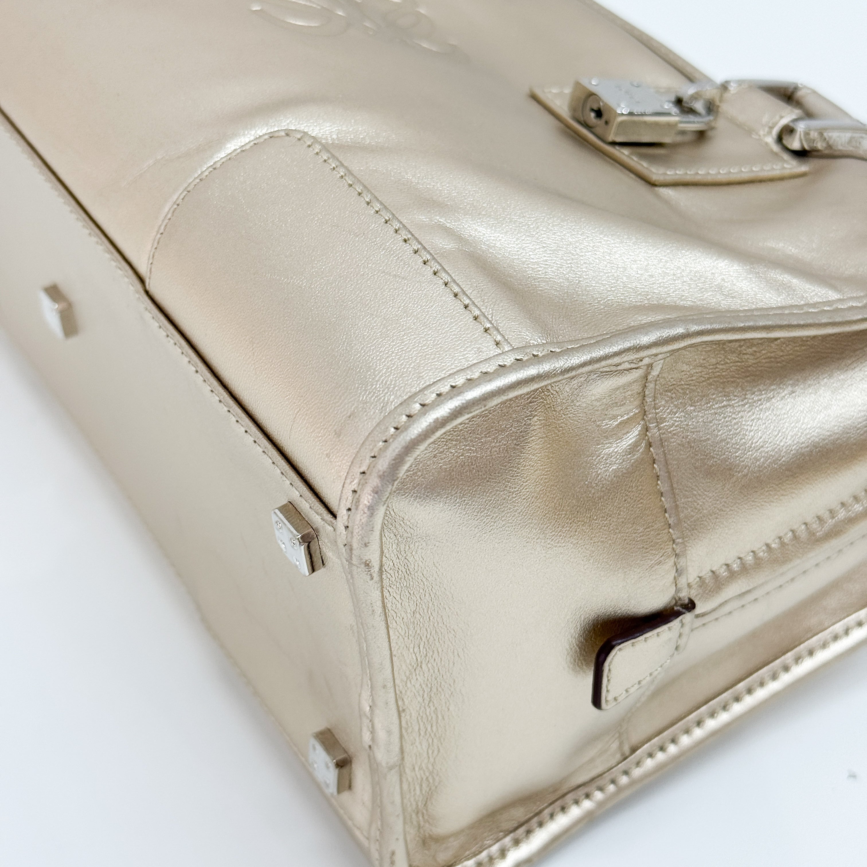Anagram Gold Leather Hand Bag