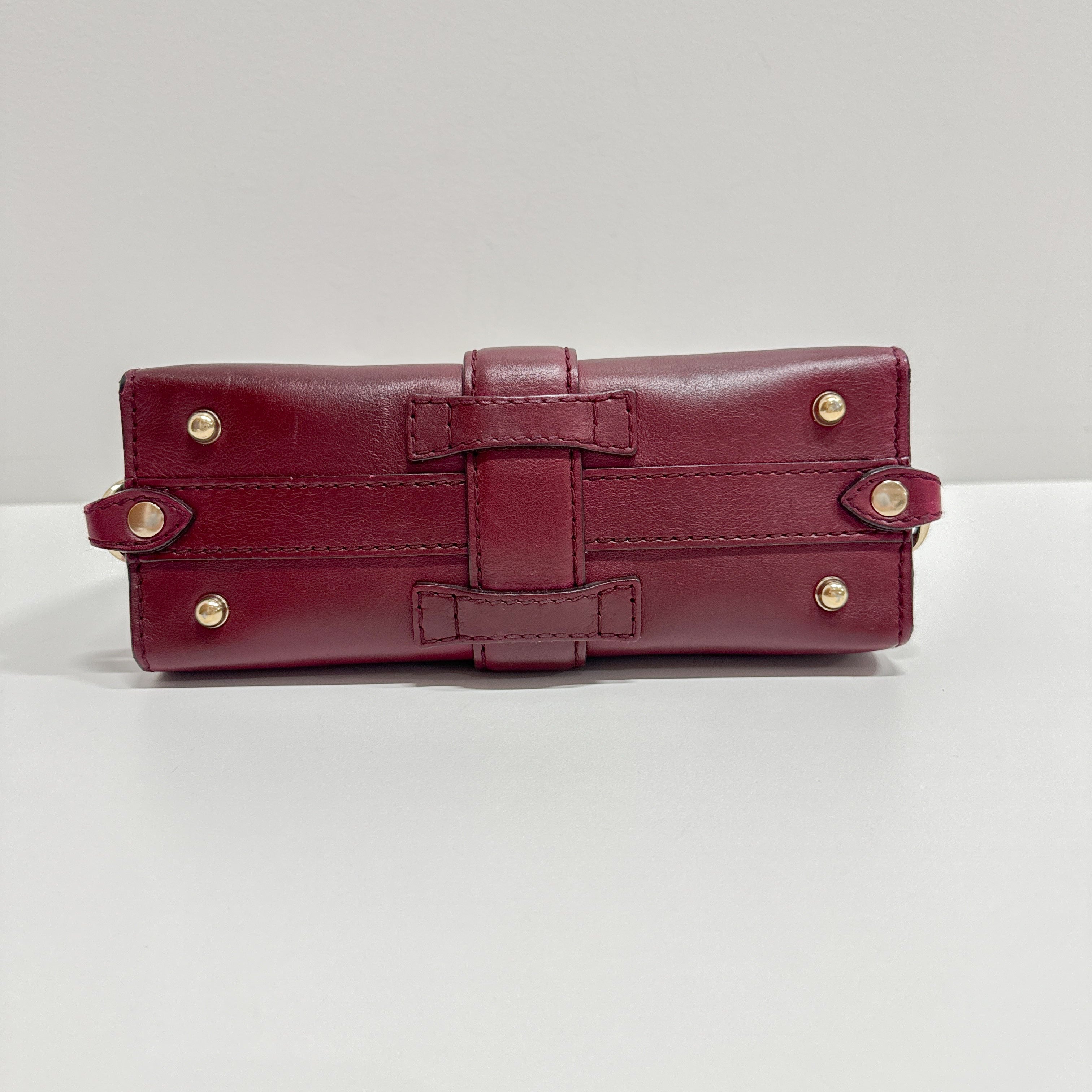 Stirrup Burgundy Leather Handbag