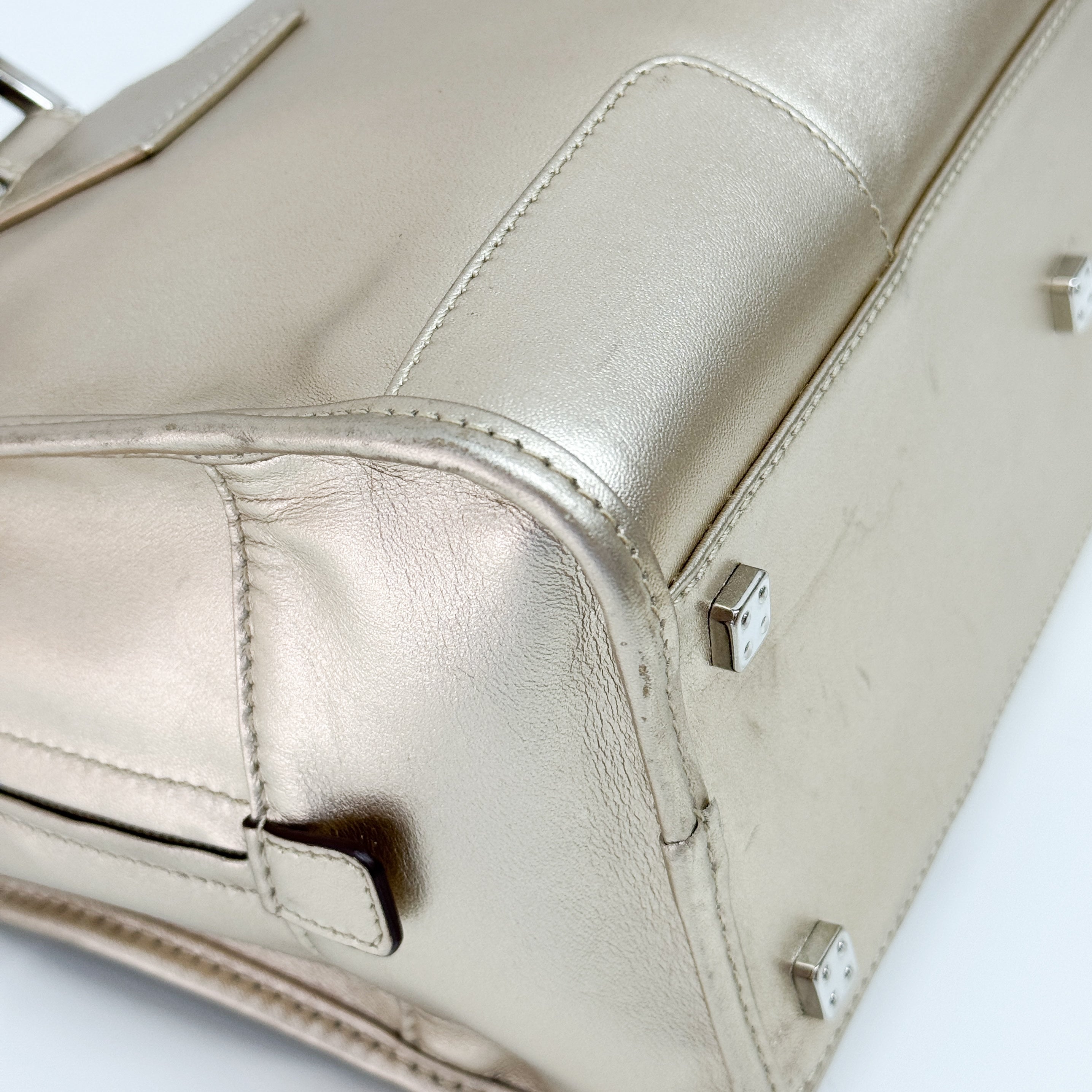 Anagram Gold Leather Hand Bag