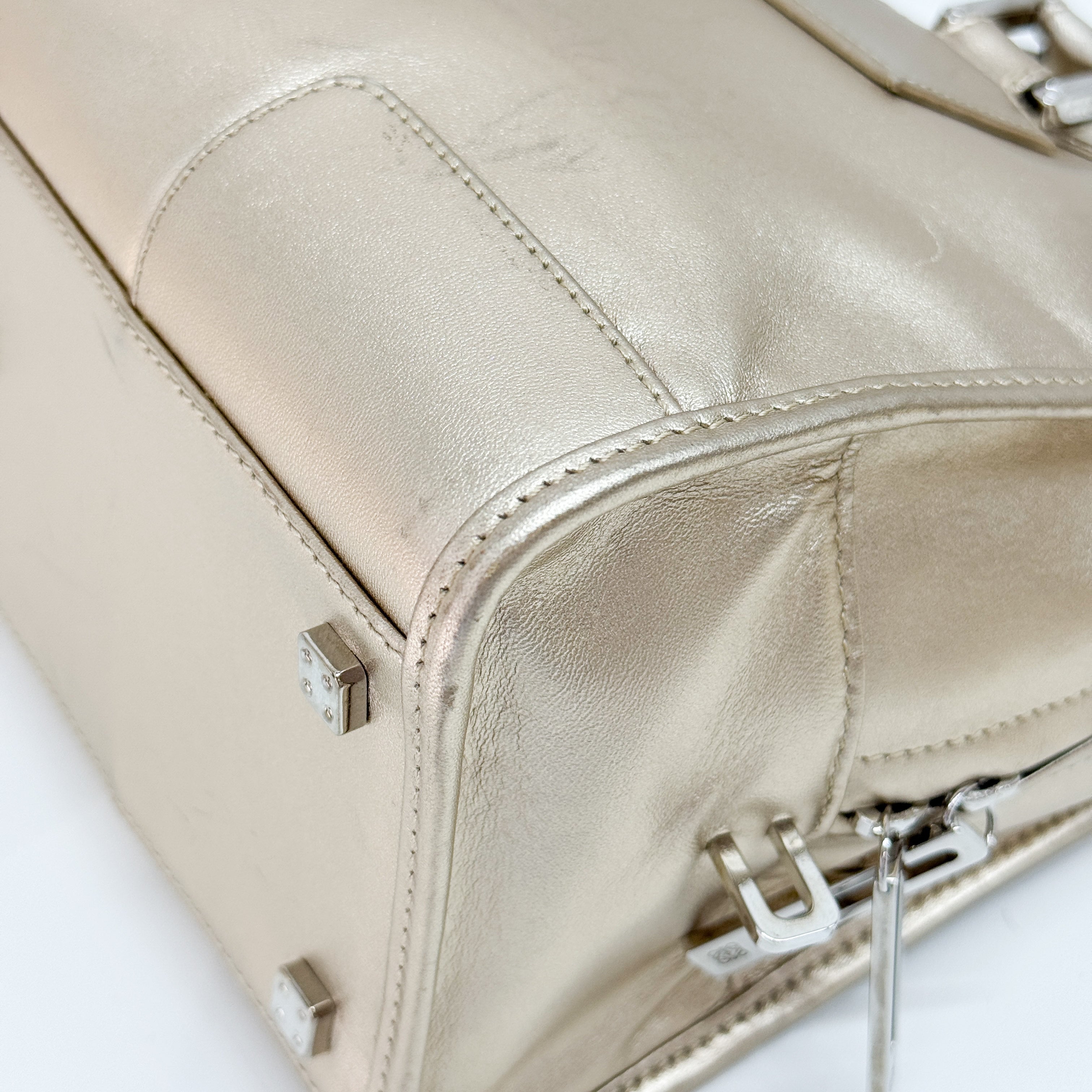 Anagram Gold Leather Hand Bag