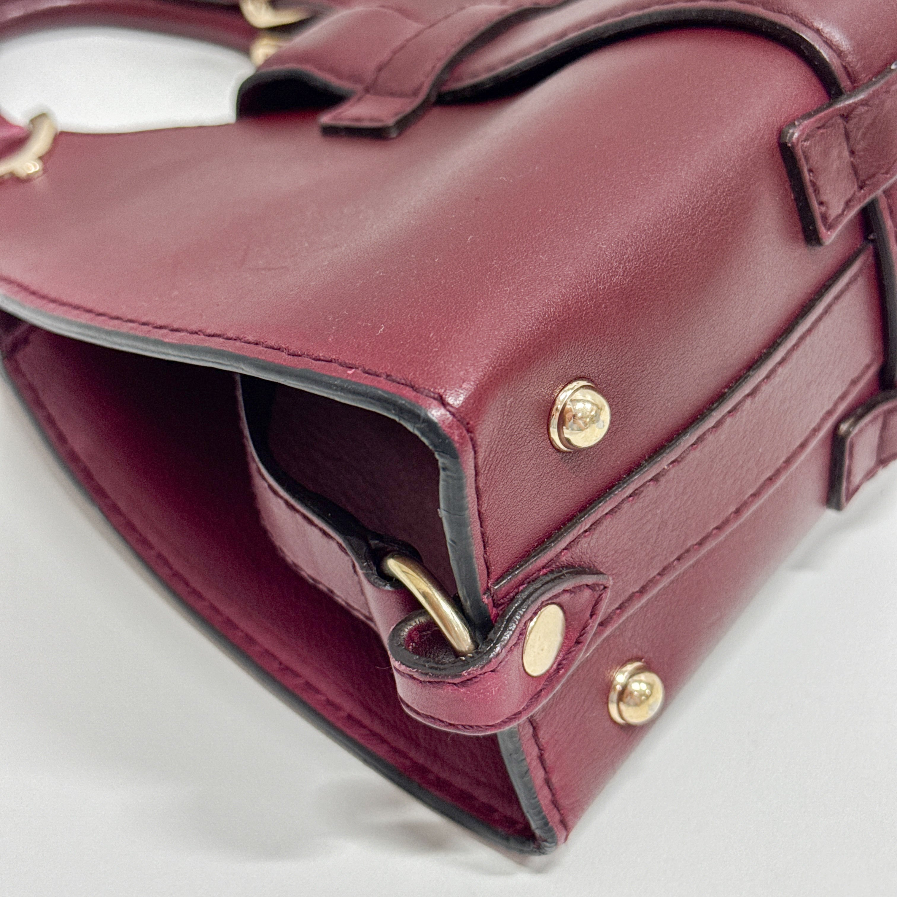 Stirrup Burgundy Leather Handbag