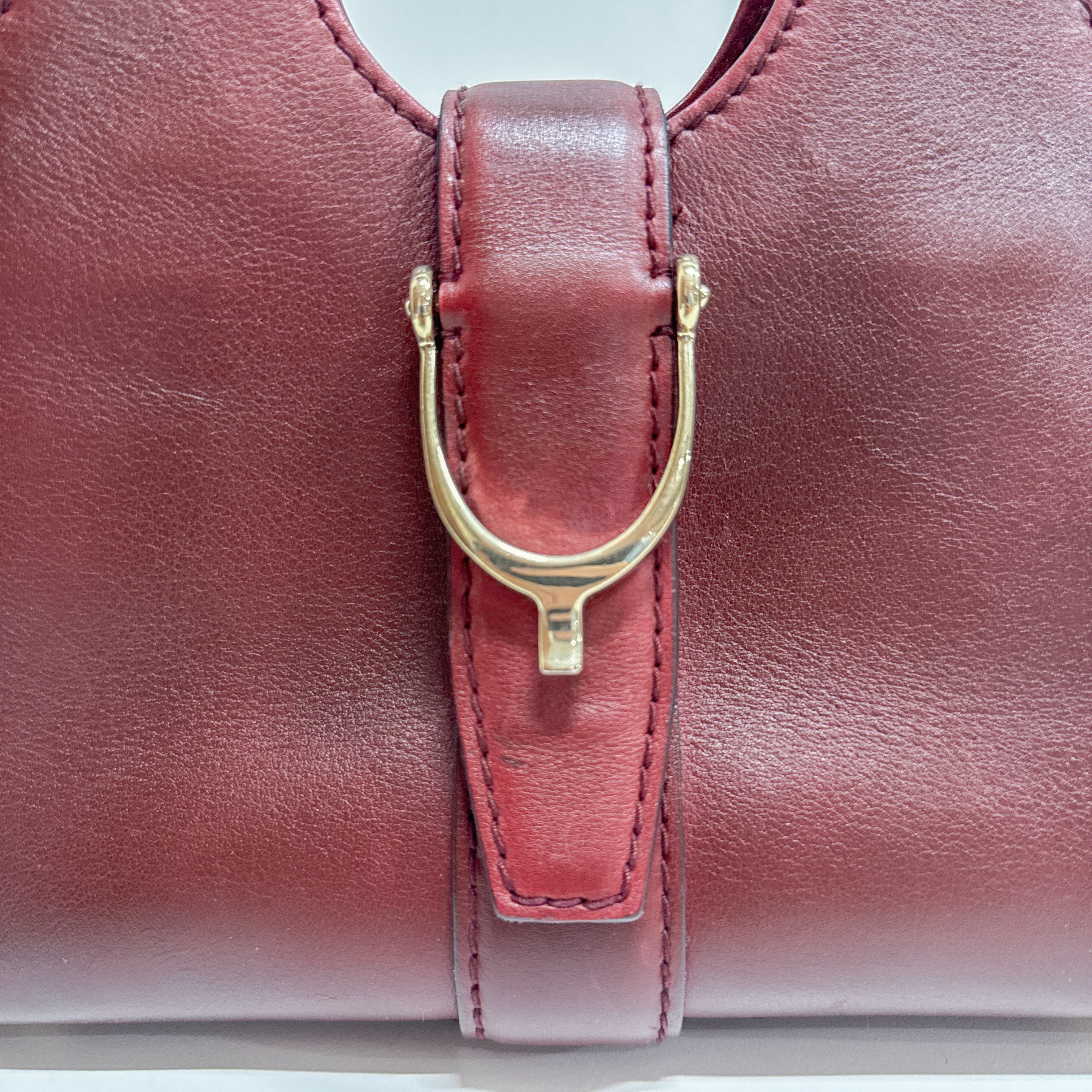 Stirrup Burgundy Leather Handbag