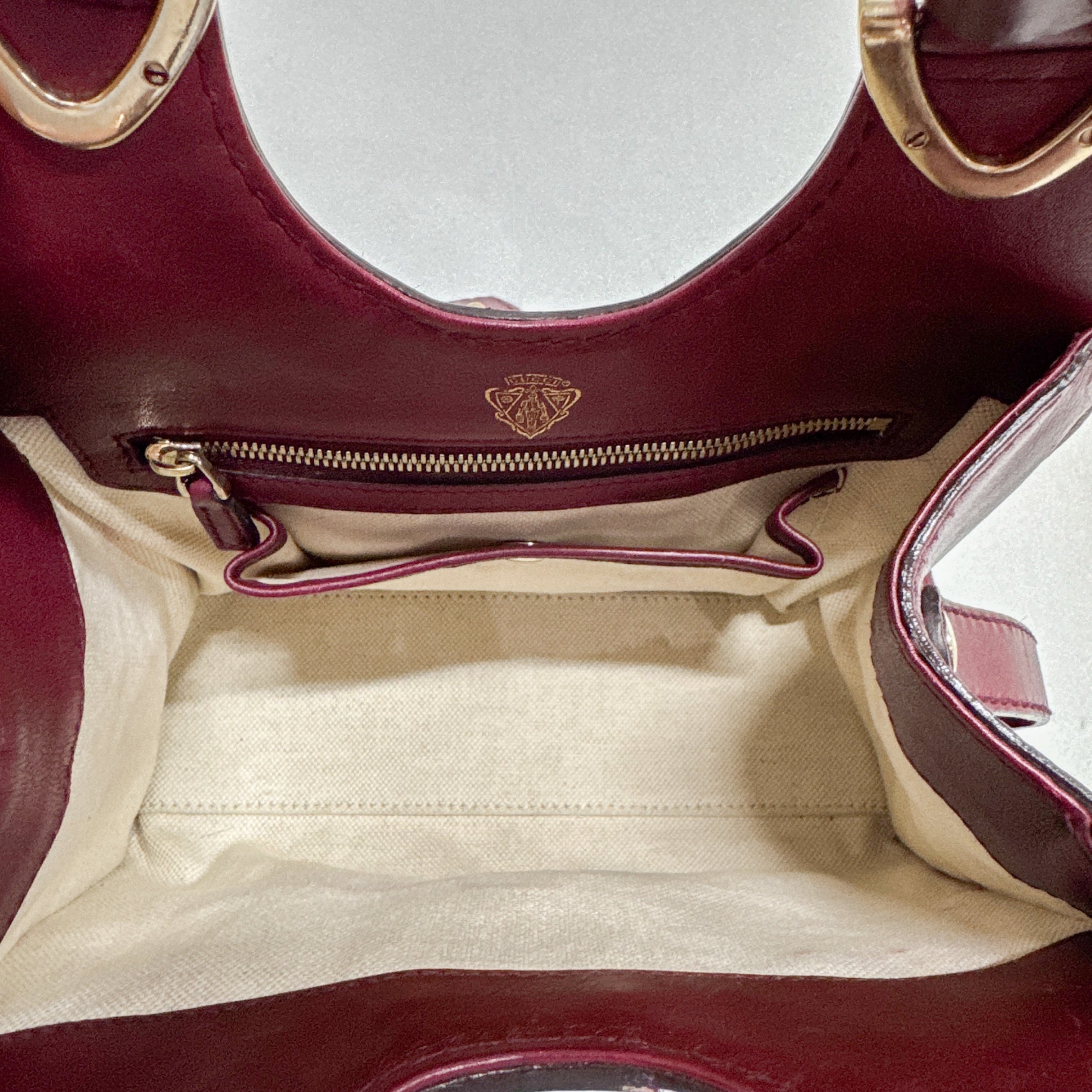 Stirrup Burgundy Leather Handbag