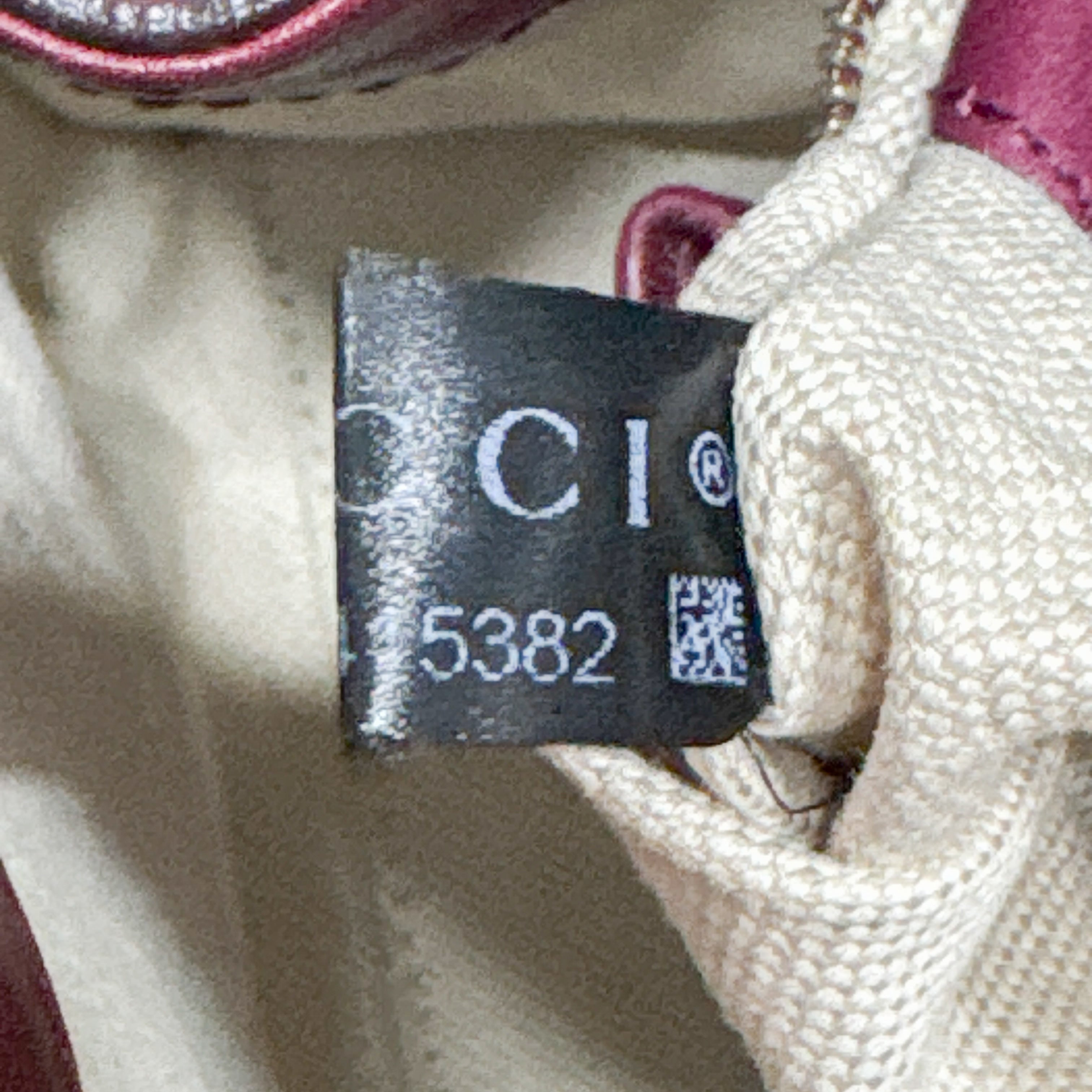 Stirrup Burgundy Leather Handbag