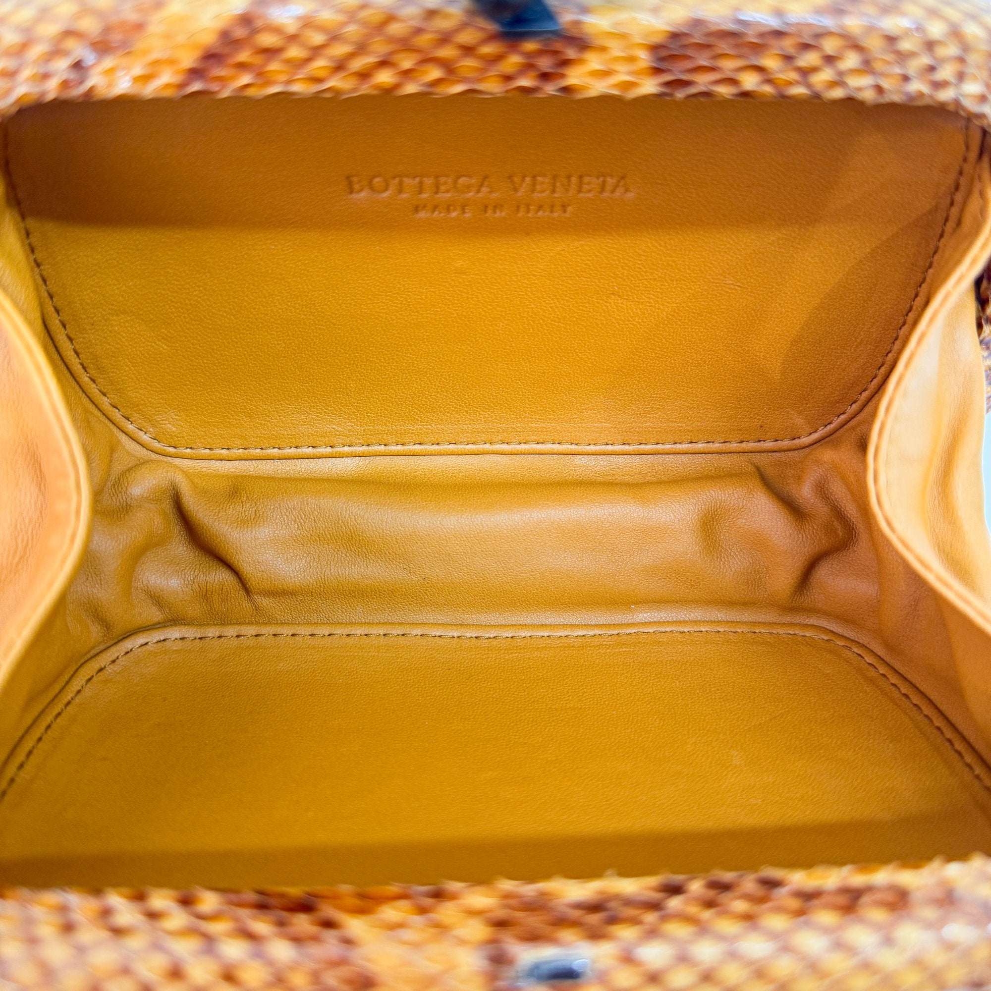 Embossed Python Lining Orange Intrecciato Knot Clutch