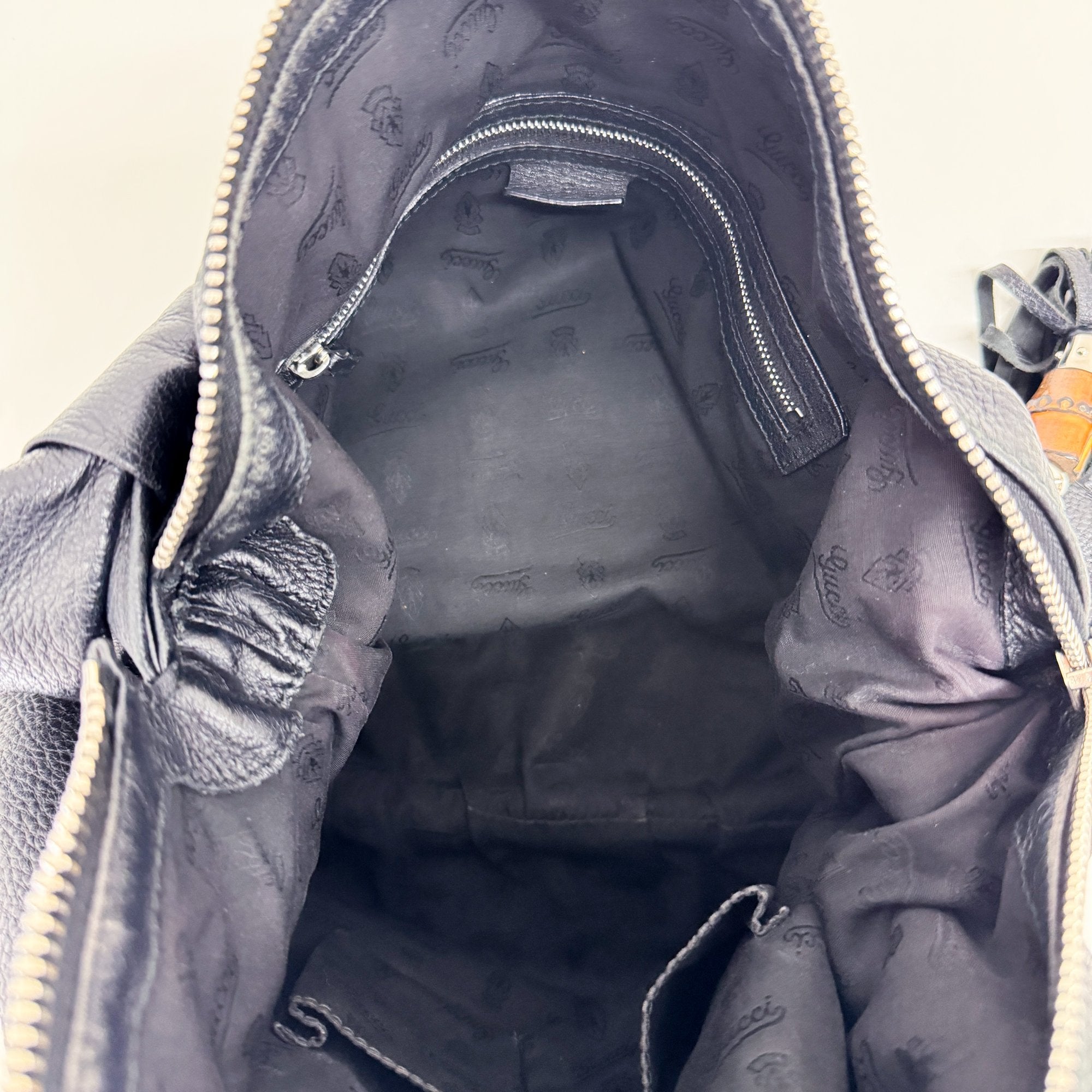 Black Leather Hobo Bag with Tassels