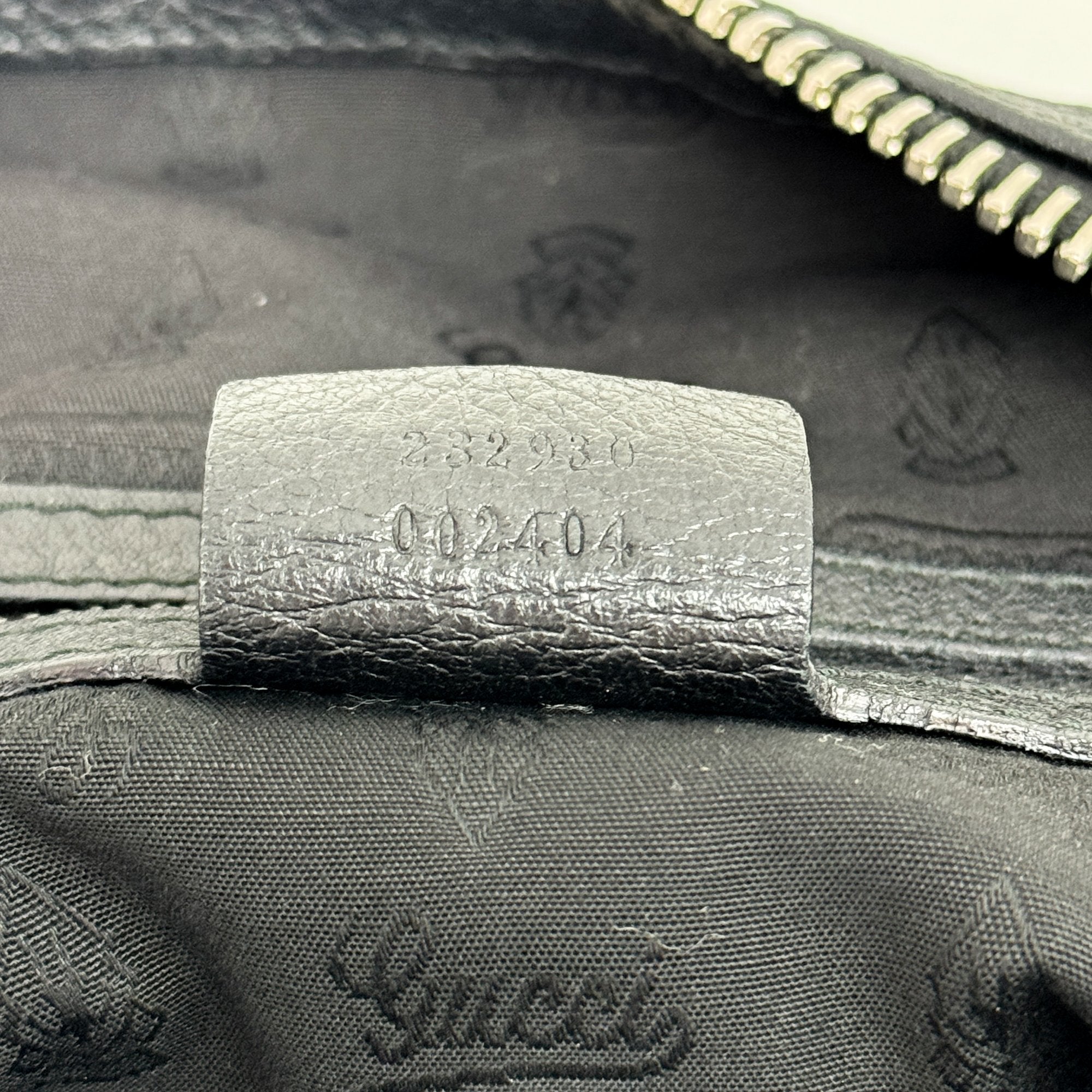 Black Leather Hobo Bag with Tassels