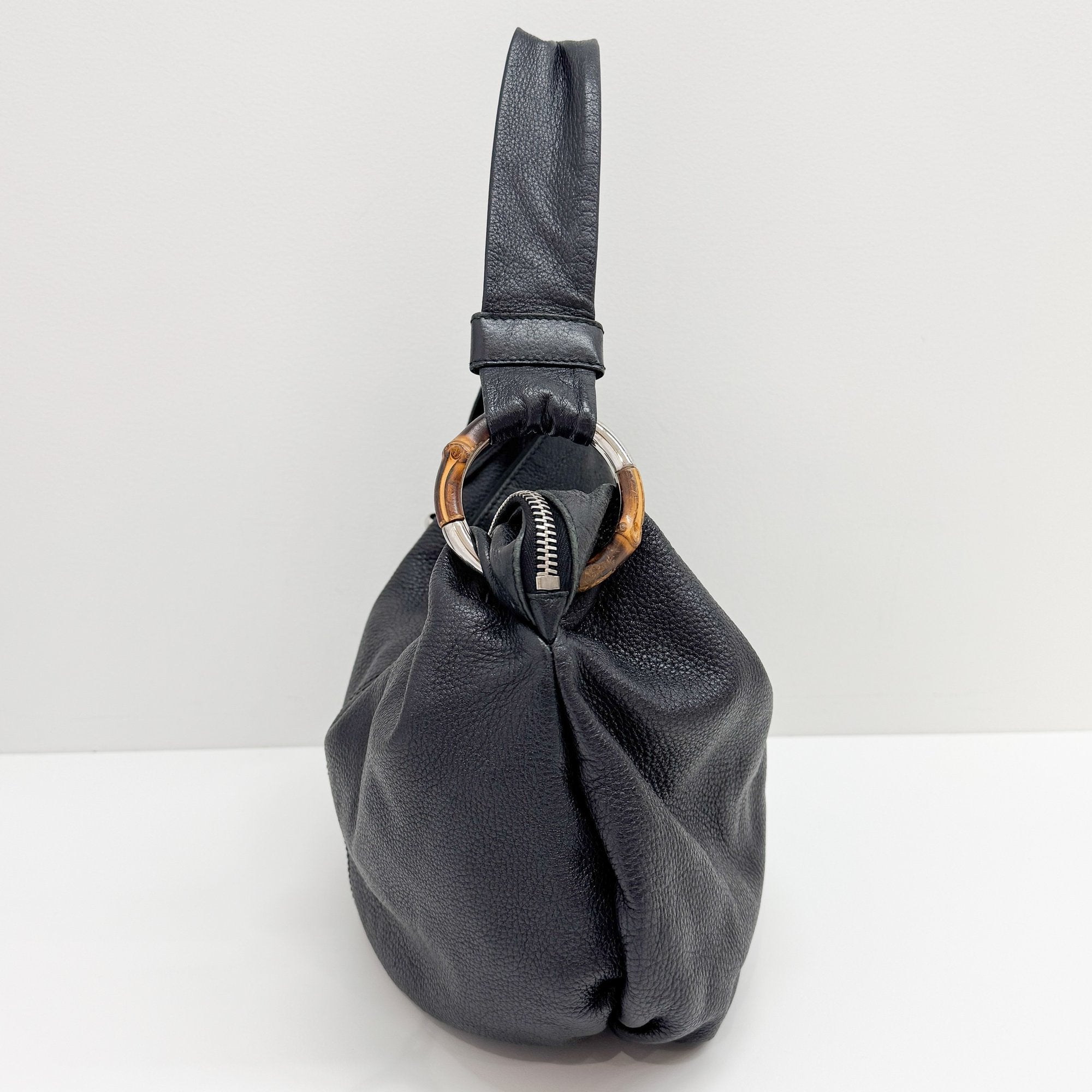 Black Leather Hobo Bag with Tassels