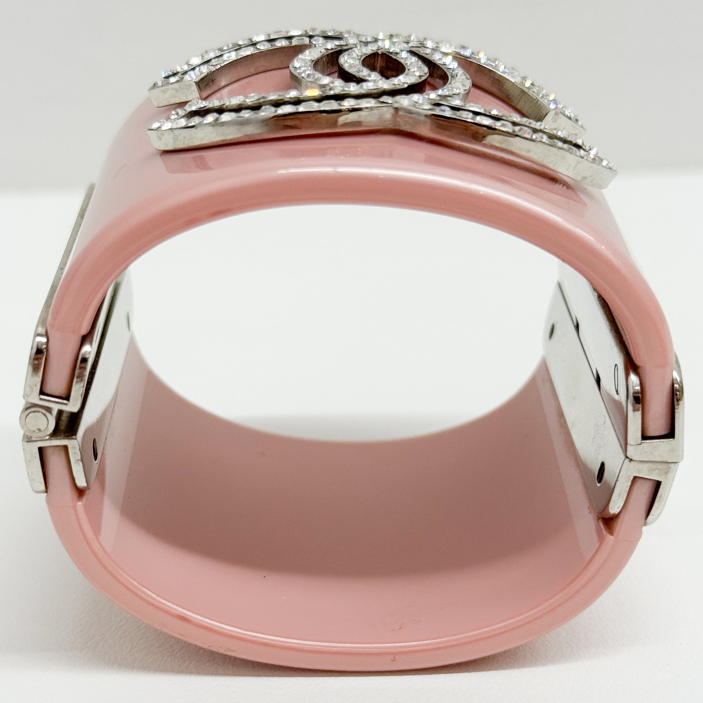 Manschette Silver Rhinestone Logo Pink Plastic Bracelet