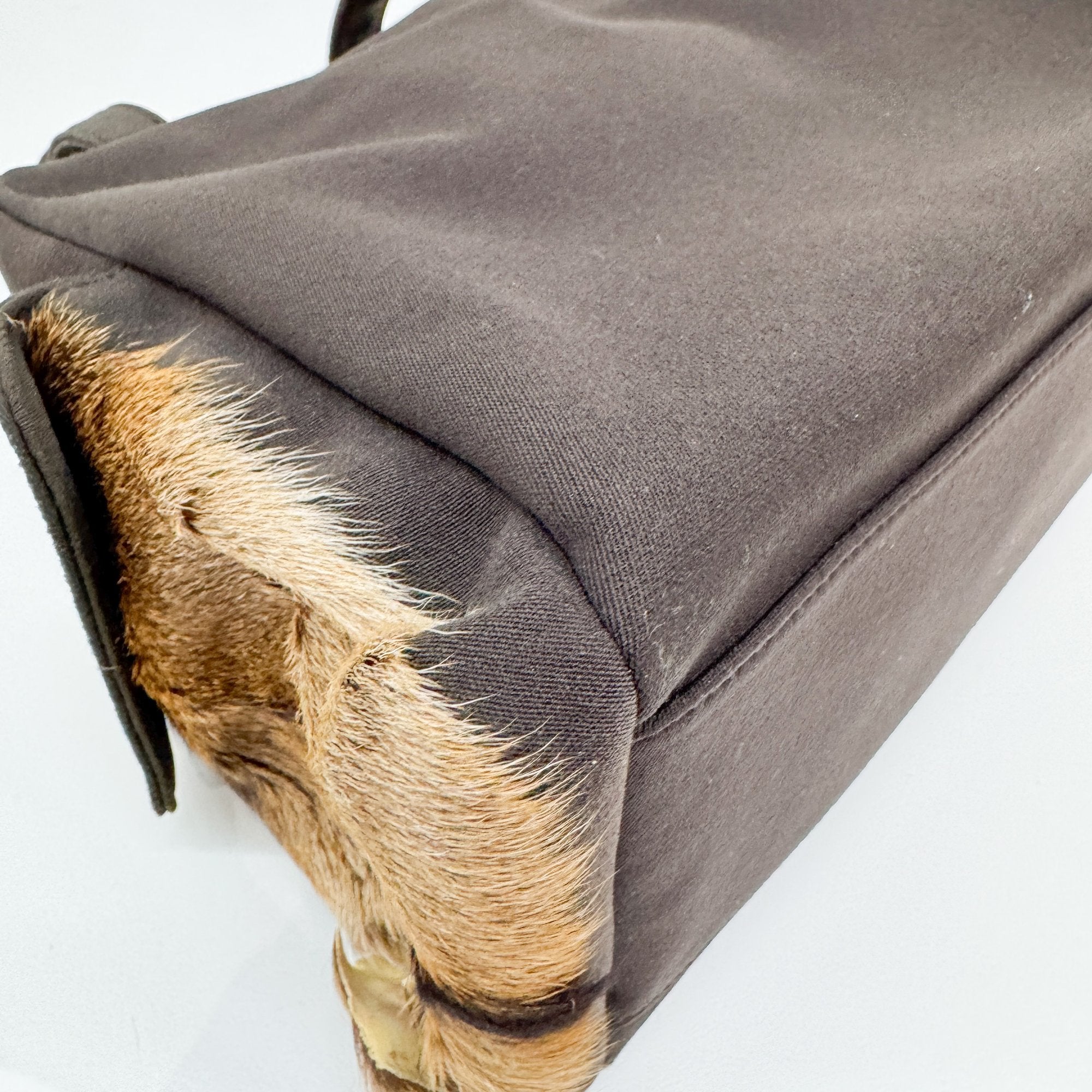 Pony Hair Side Pockets Black Neoprene Hand Bag