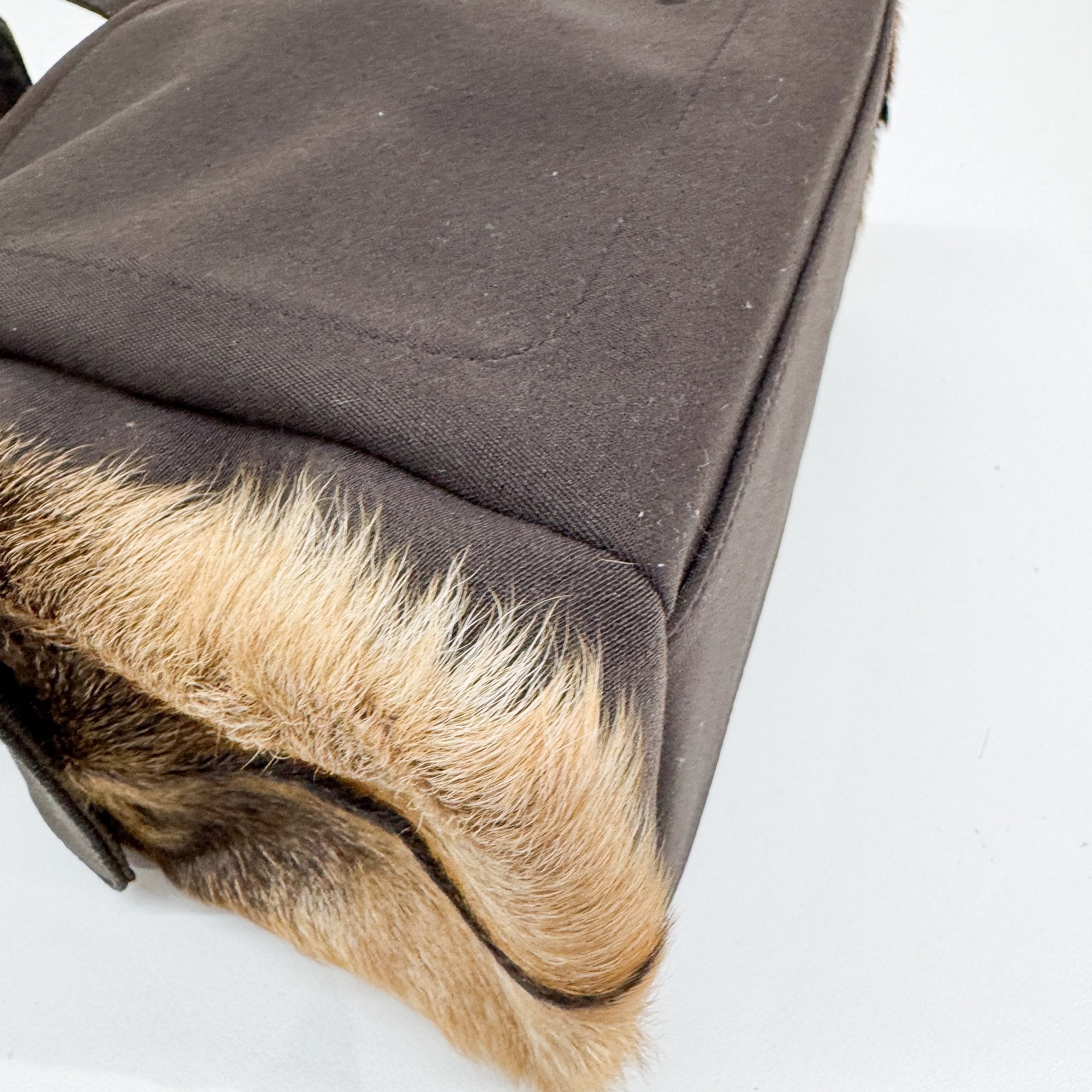 Pony Hair Side Pockets Black Neoprene Hand Bag