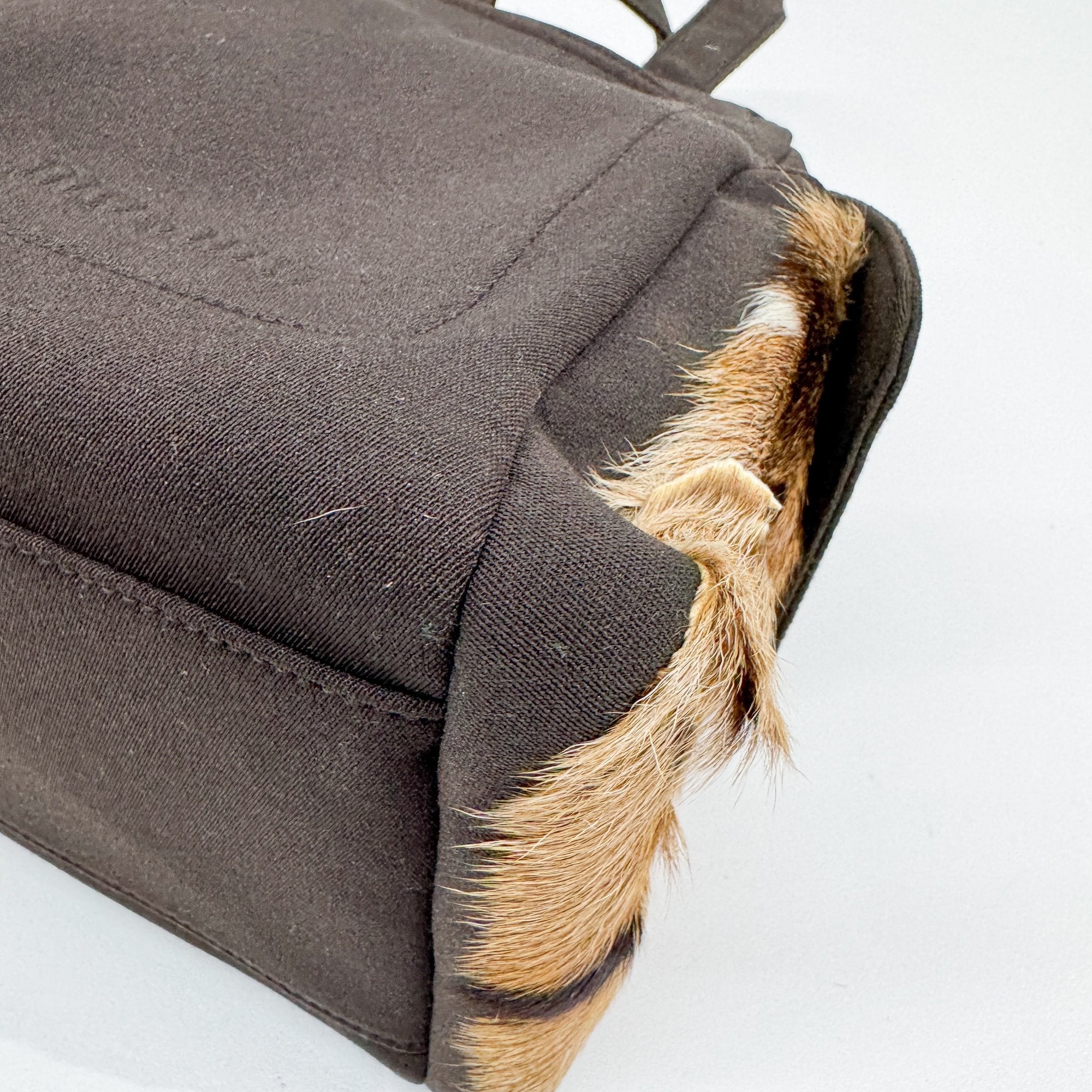 Pony Hair Side Pockets Black Neoprene Hand Bag