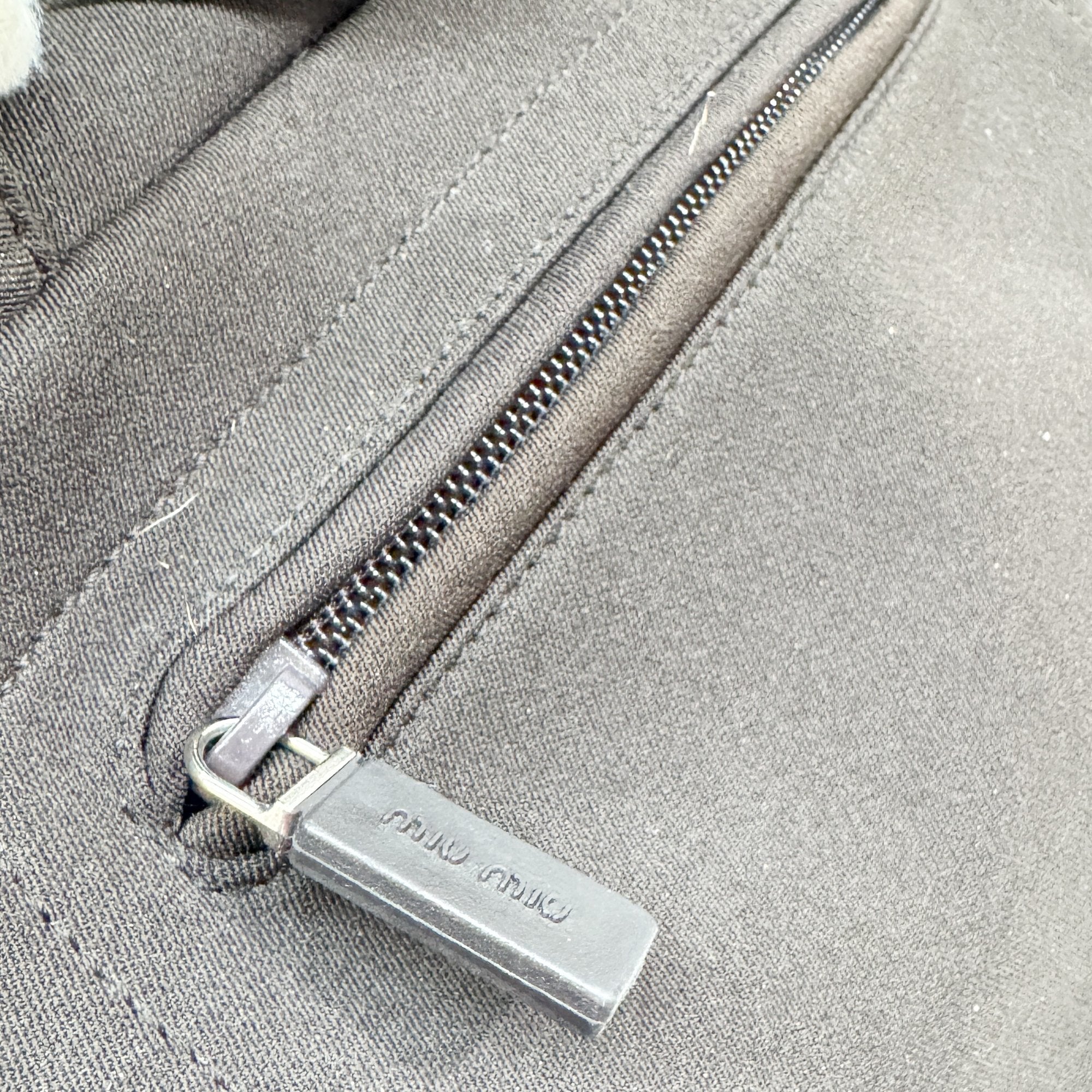 Pony Hair Side Pockets Black Neoprene Hand Bag