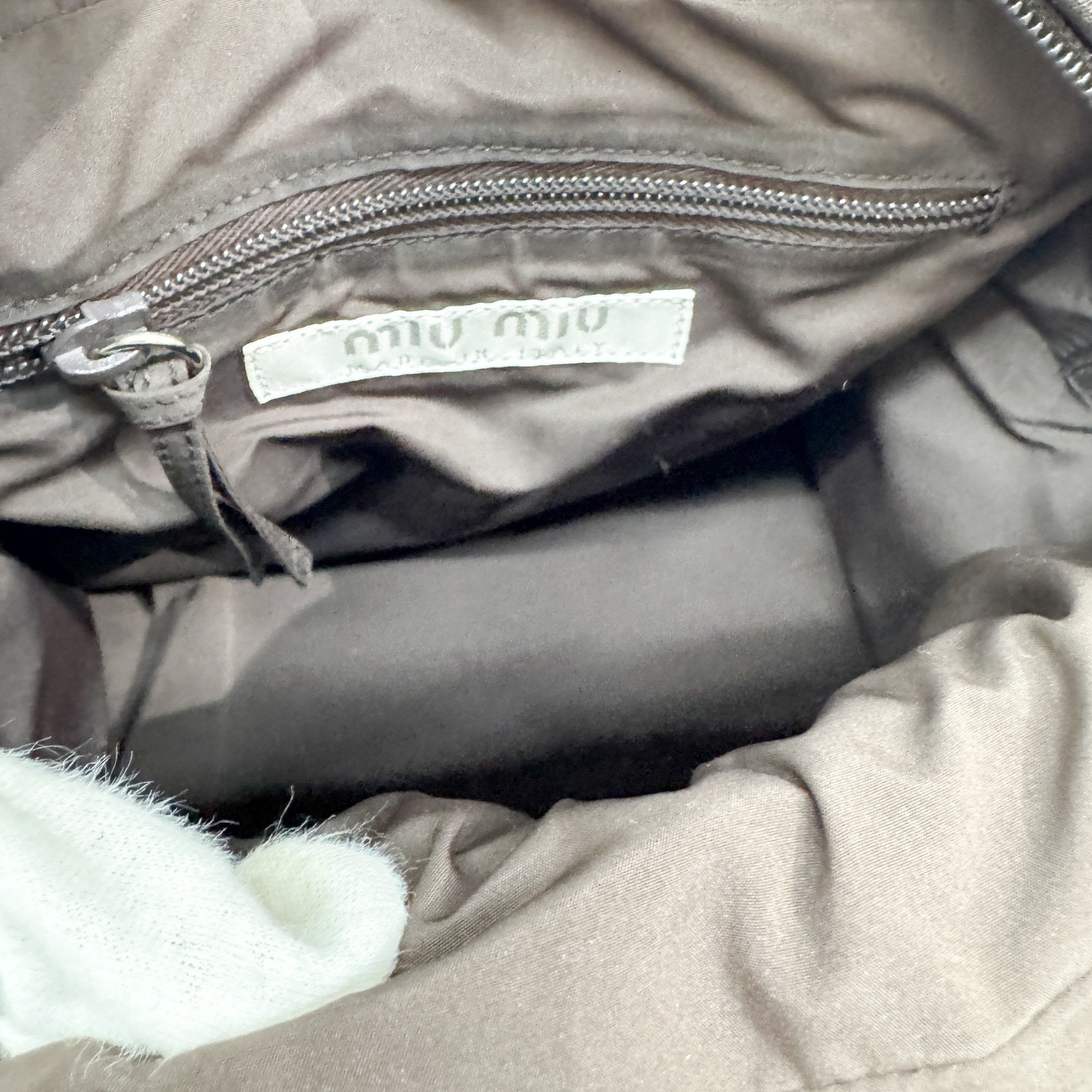 Pony Hair Side Pockets Black Neoprene Hand Bag