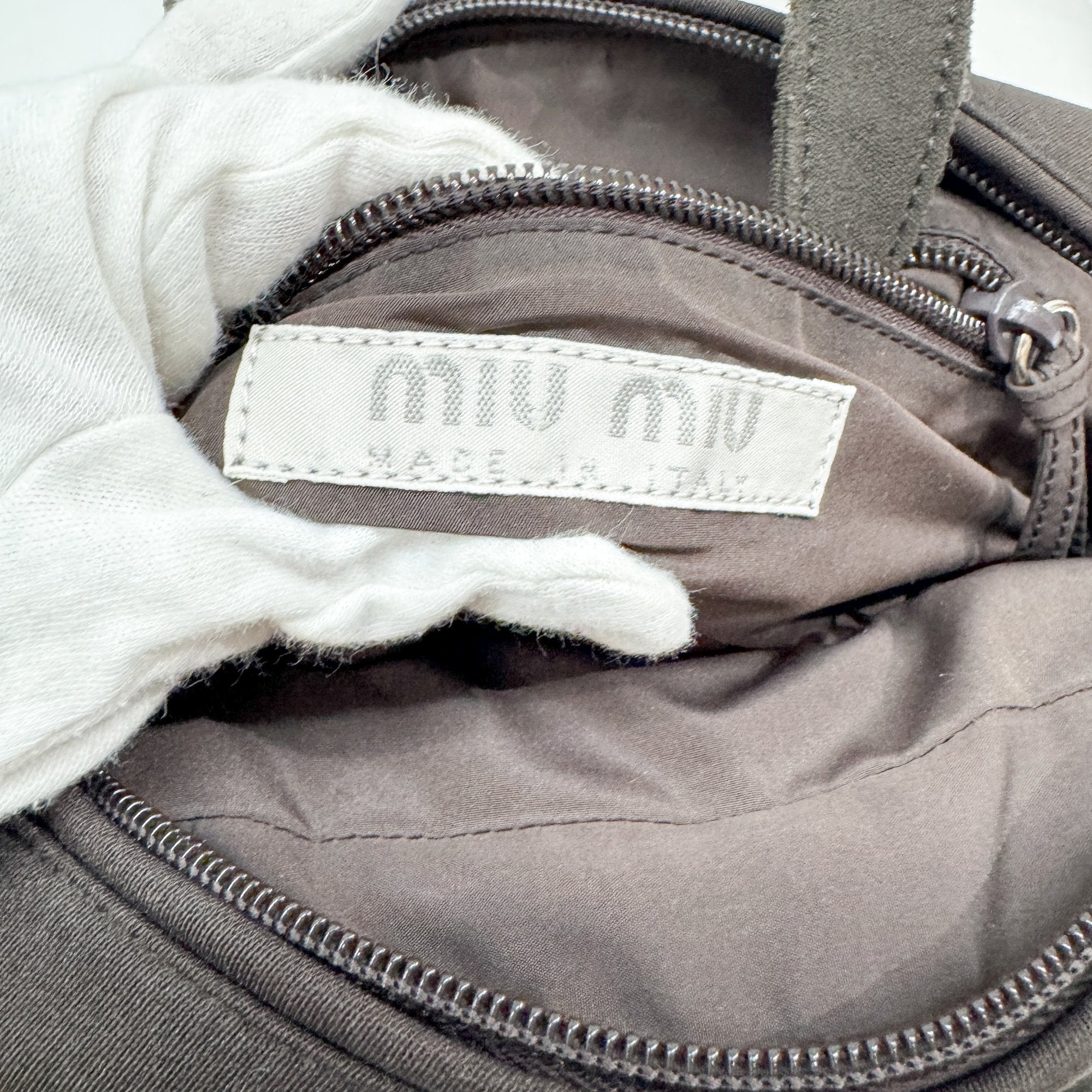 Pony Hair Side Pockets Black Neoprene Hand Bag