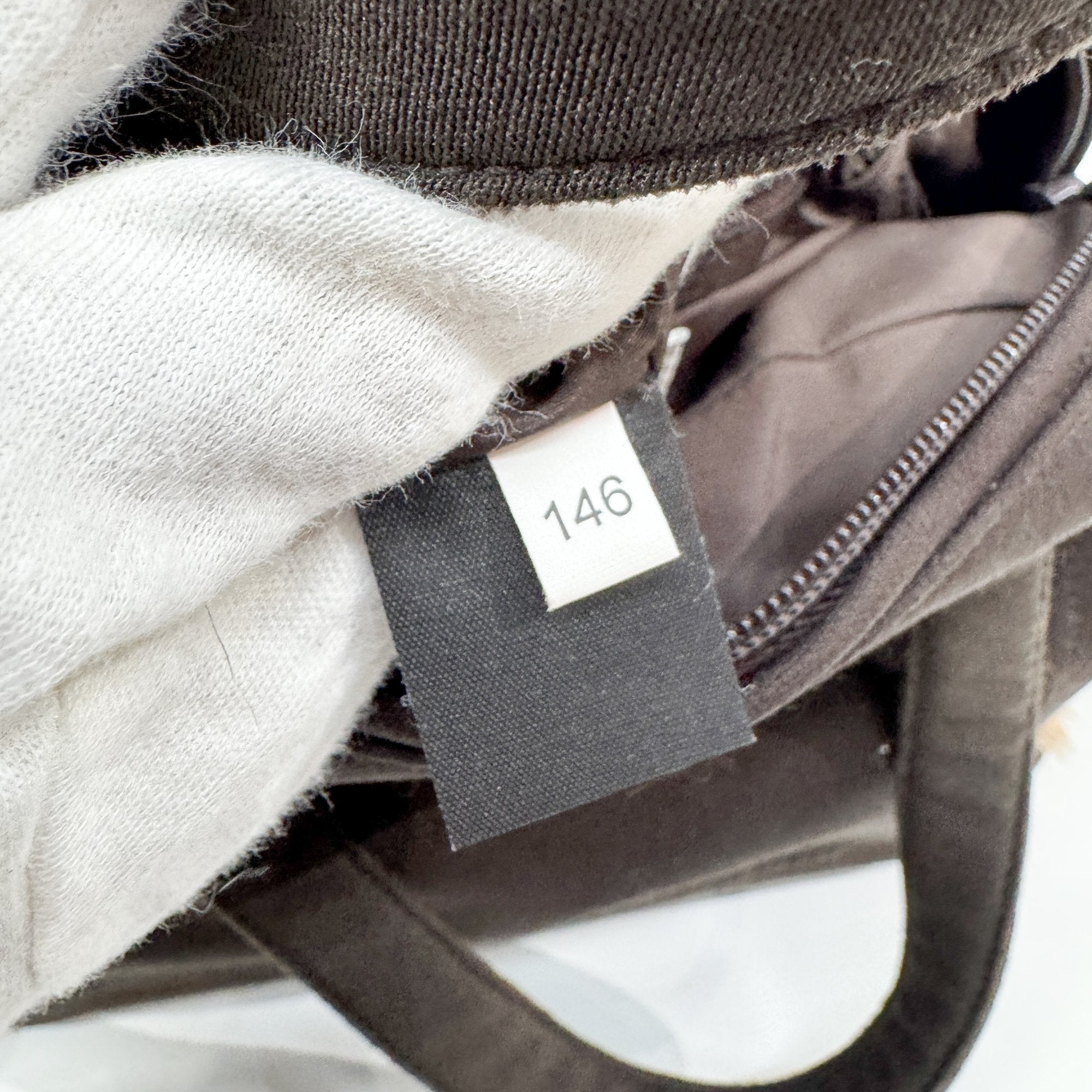 Pony Hair Side Pockets Black Neoprene Hand Bag