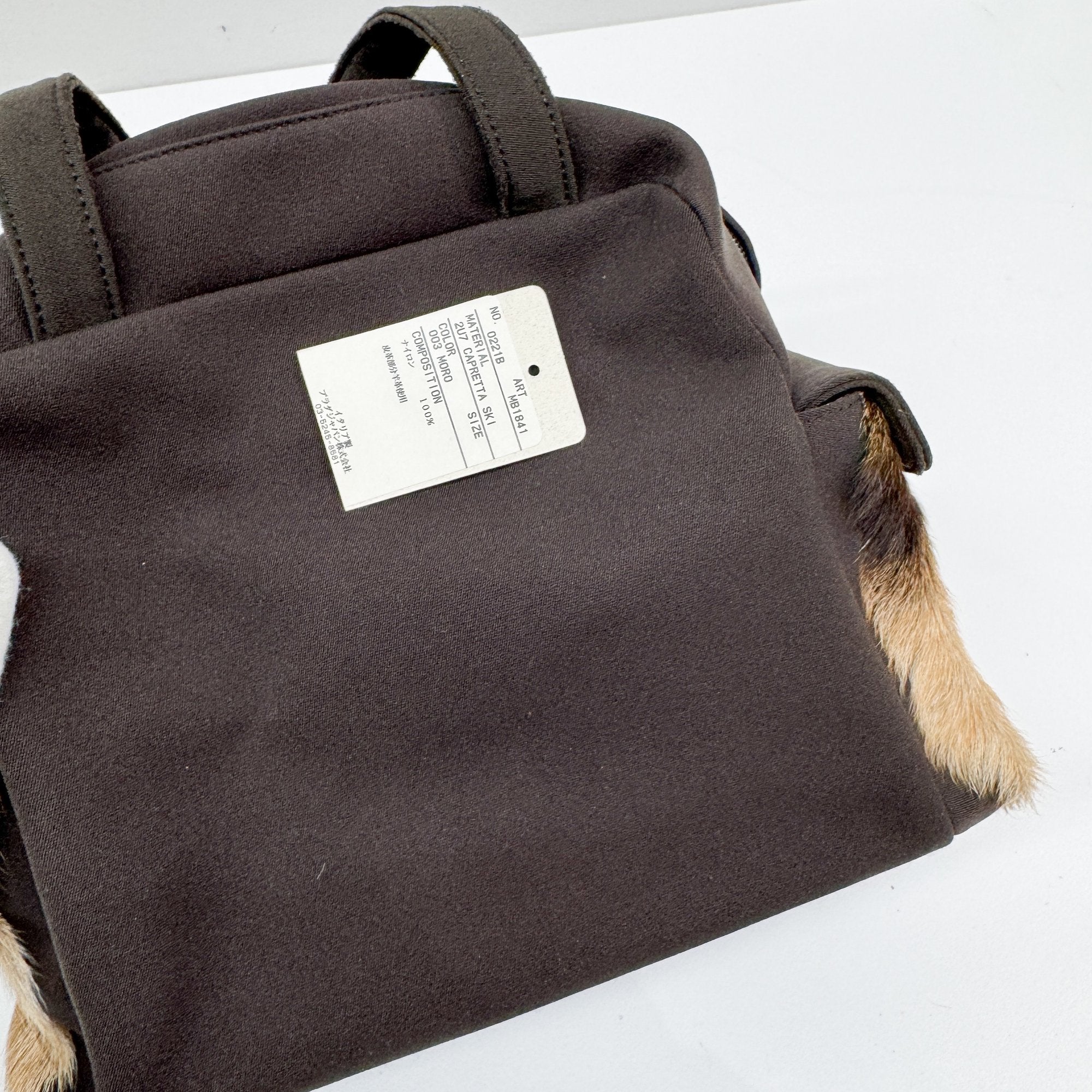 Pony Hair Side Pockets Black Neoprene Hand Bag