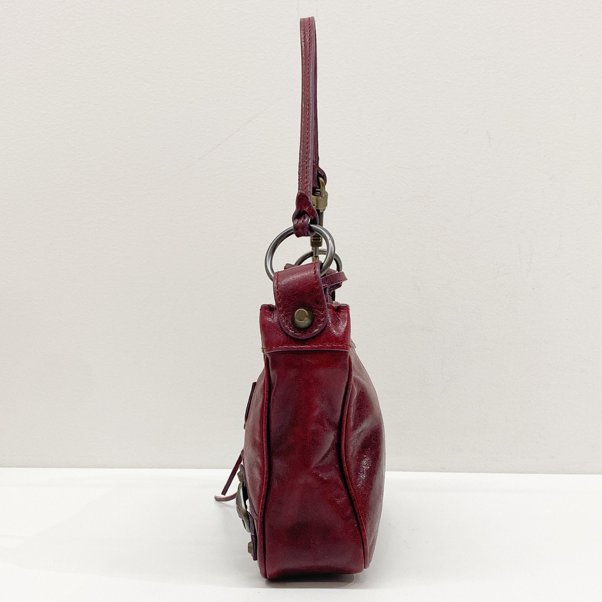 The City Pouch Red Leather Hand Bag