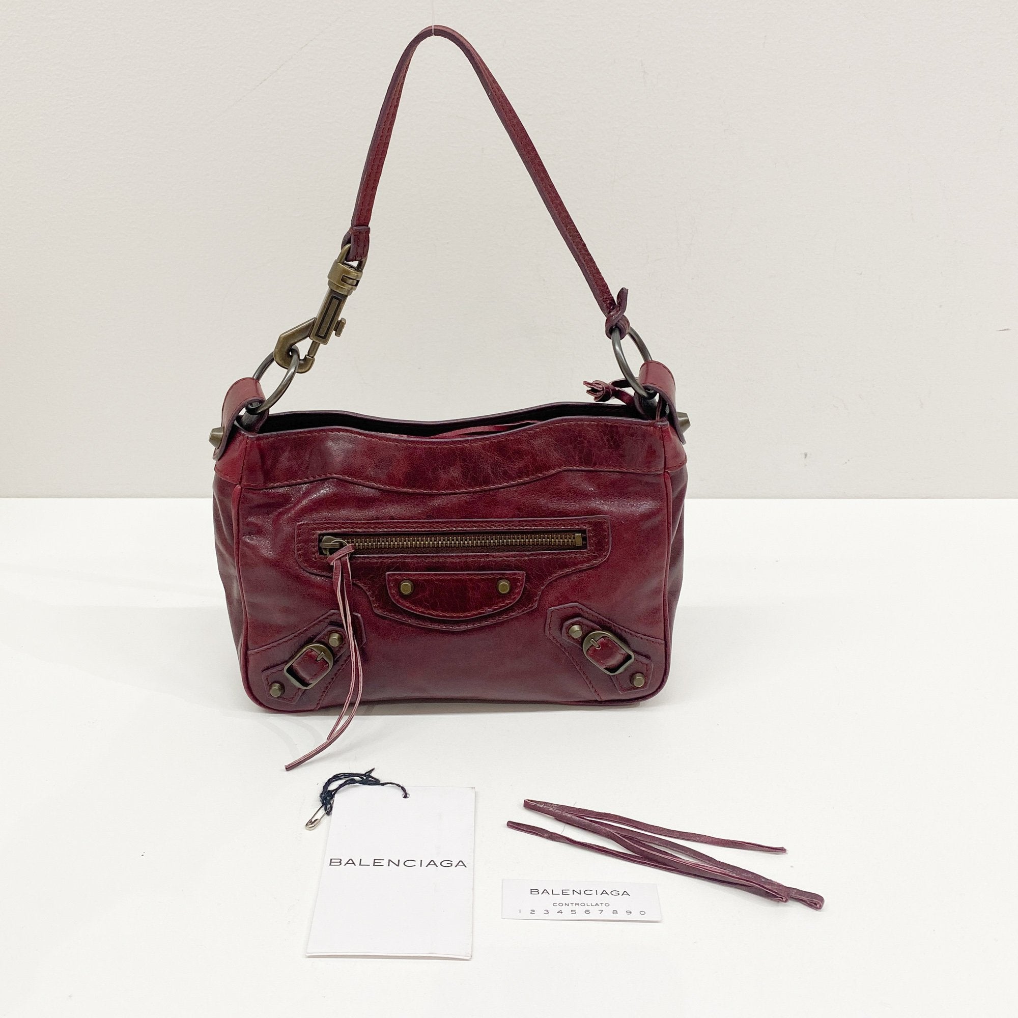 The City Pouch Red Leather Hand Bag