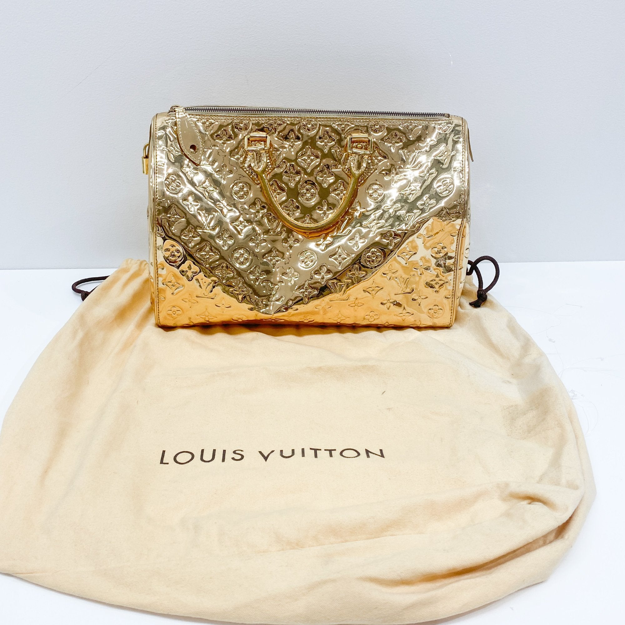 Miroir Speedy 35 Gold Monogram Canvas Hand Bag