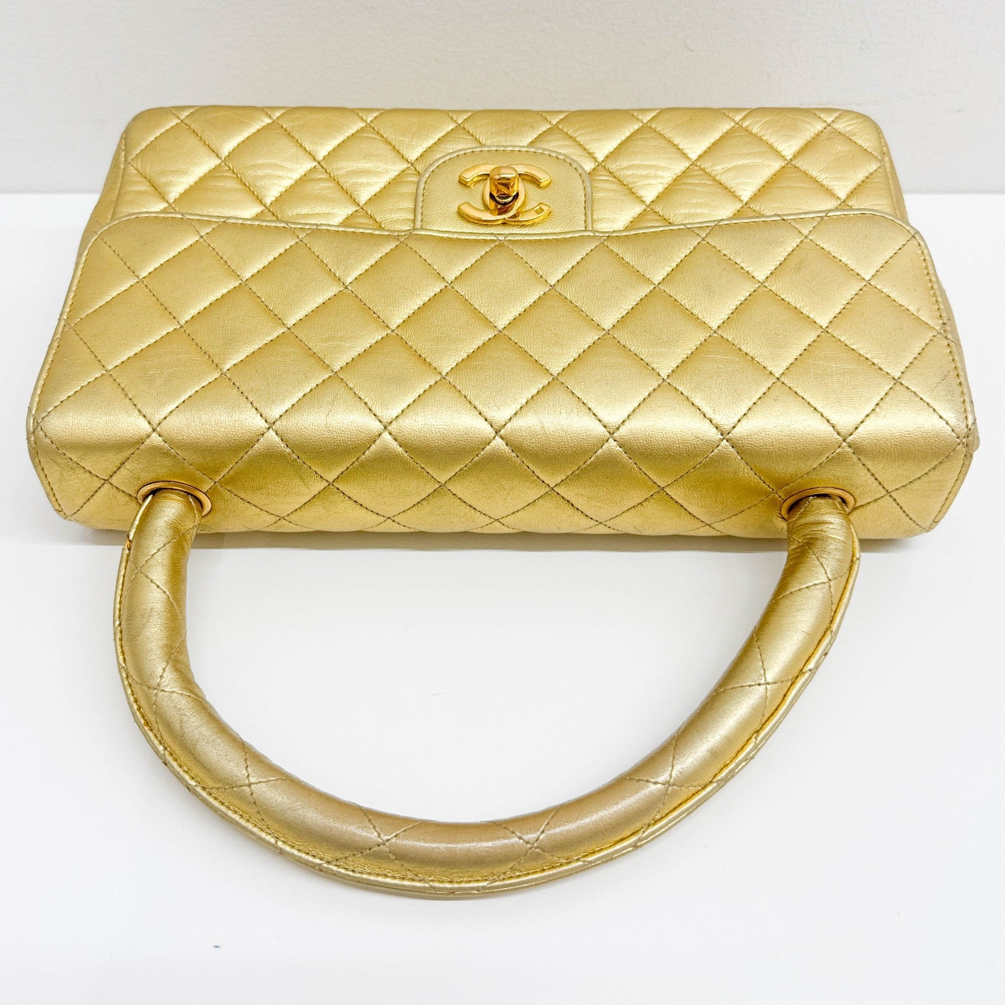 Set Of 2 Coco Handle Matelasse Gold Leather Hand Bags