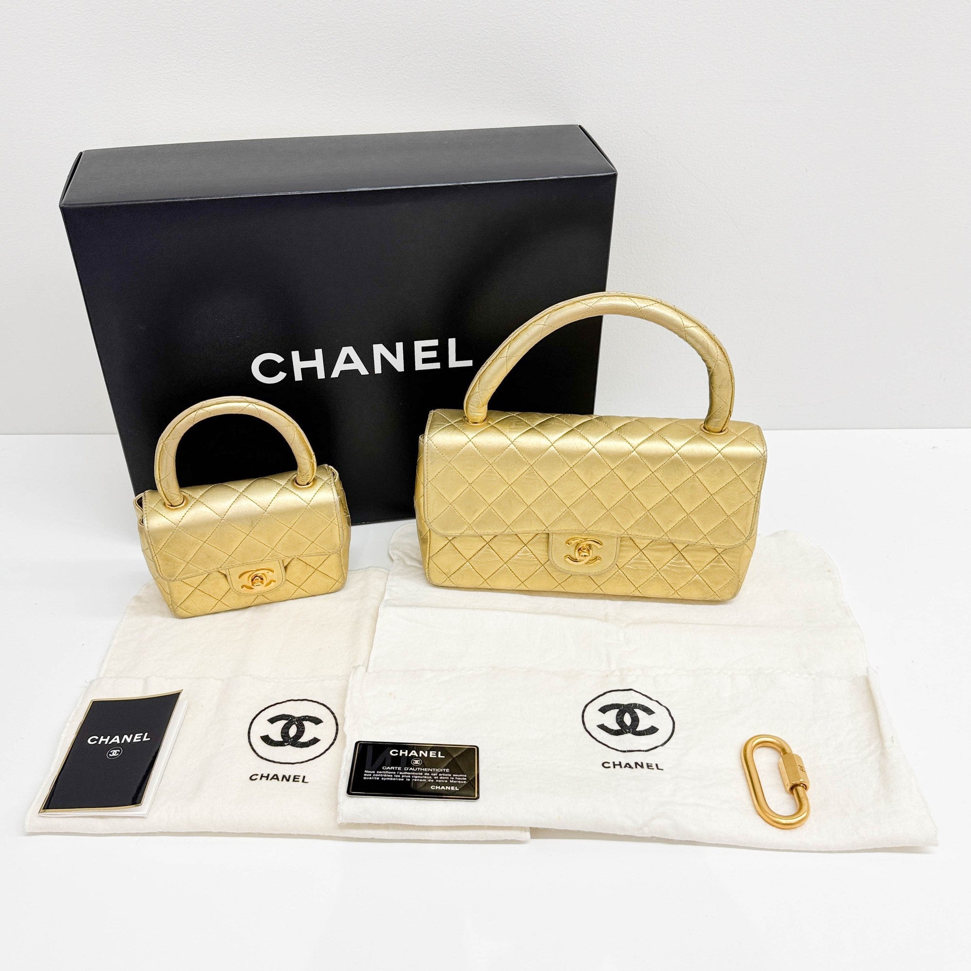 Set Of 2 Coco Handle Matelasse Gold Leather Hand Bags