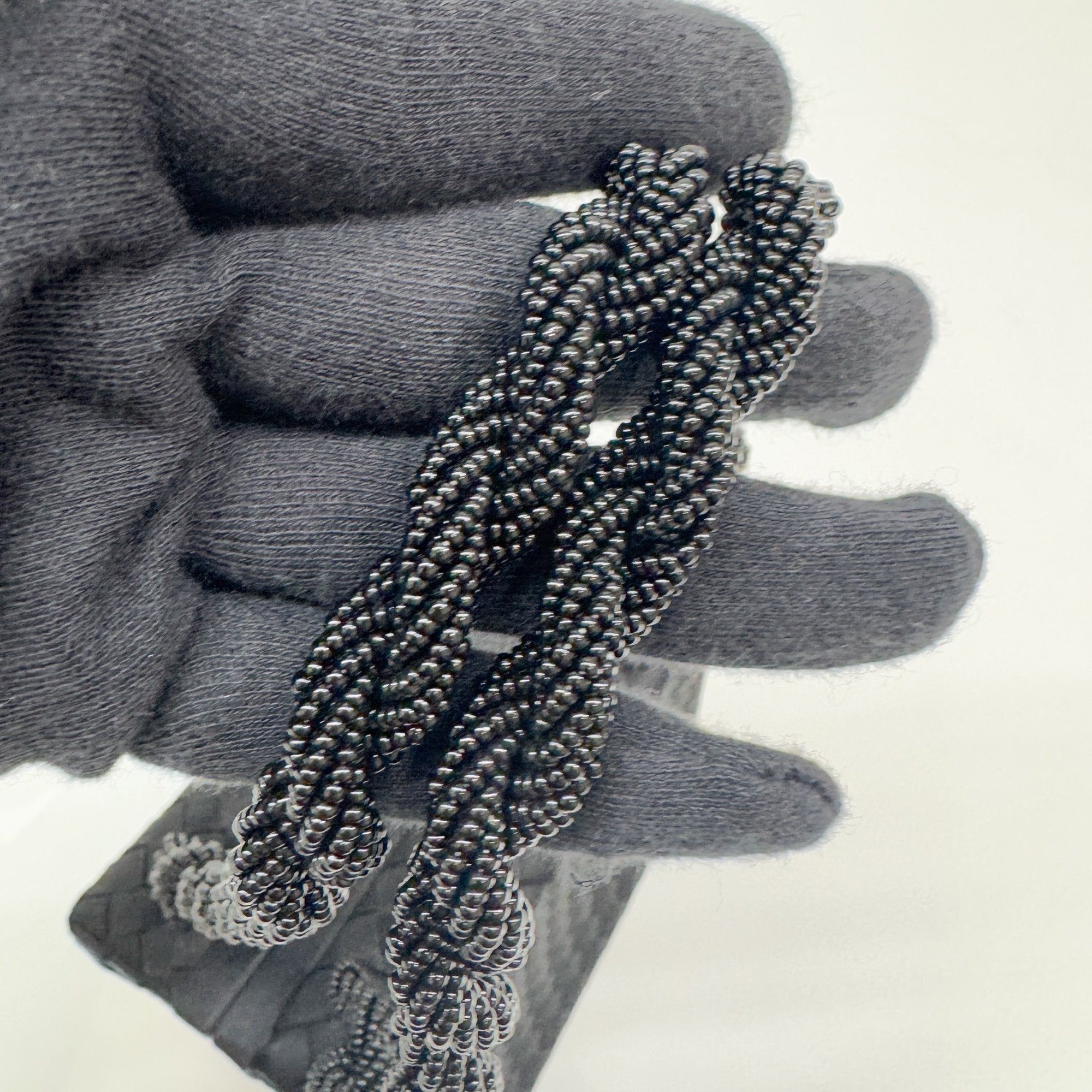 Intrecciato Box Black Satin Hand Bag