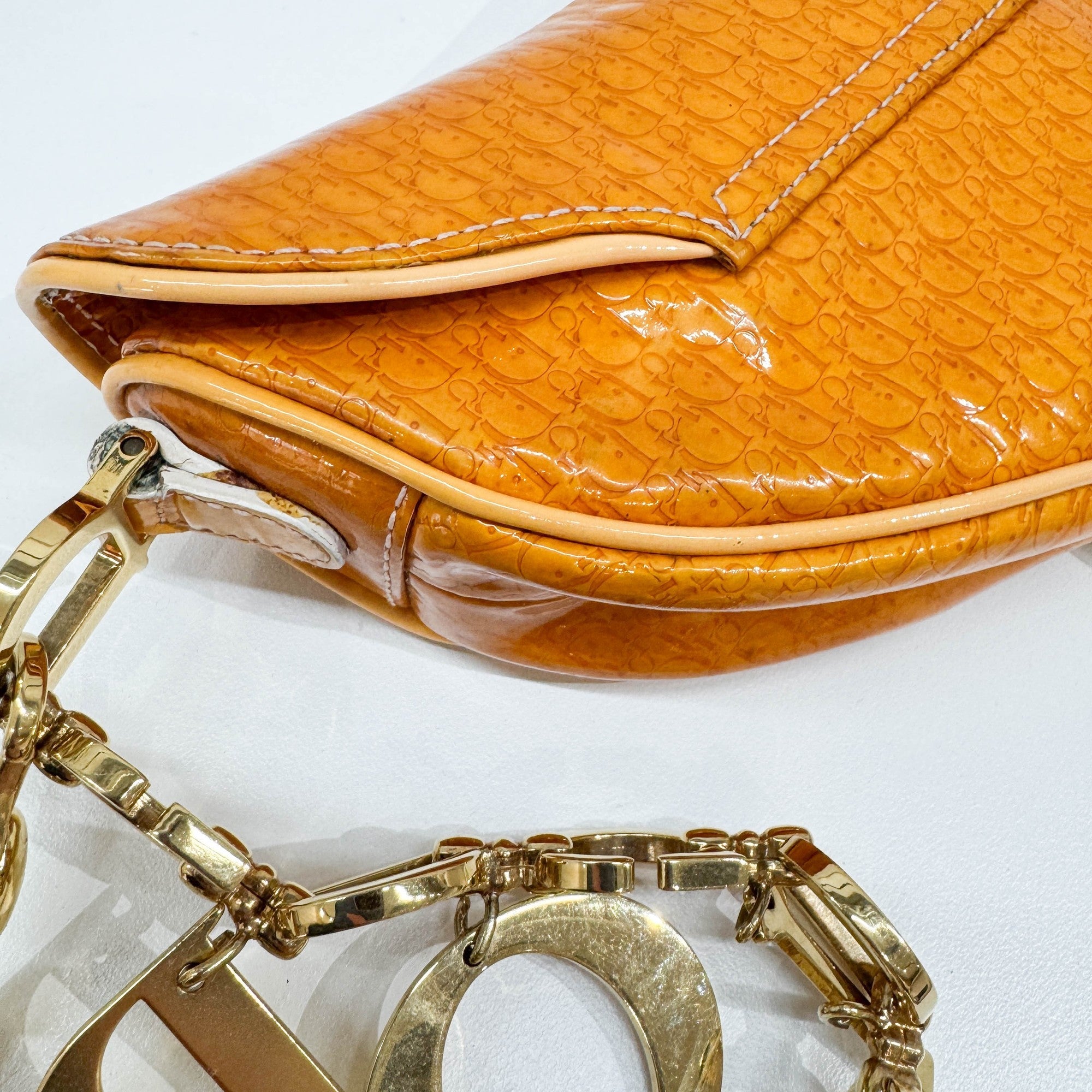 Nano Saddle Orange Trotter Leather Clutch Bag