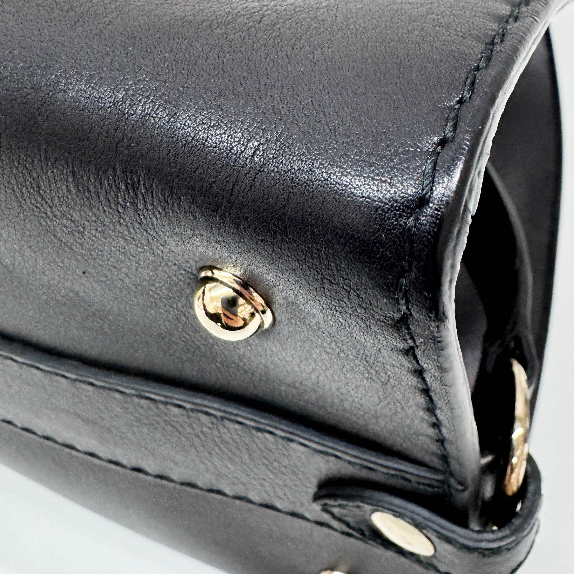 Stirrup Black Leather Hand Bag