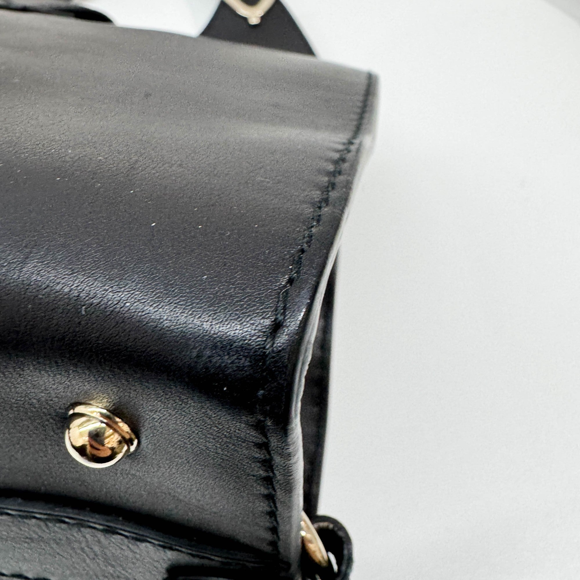 Stirrup Black Leather Hand Bag