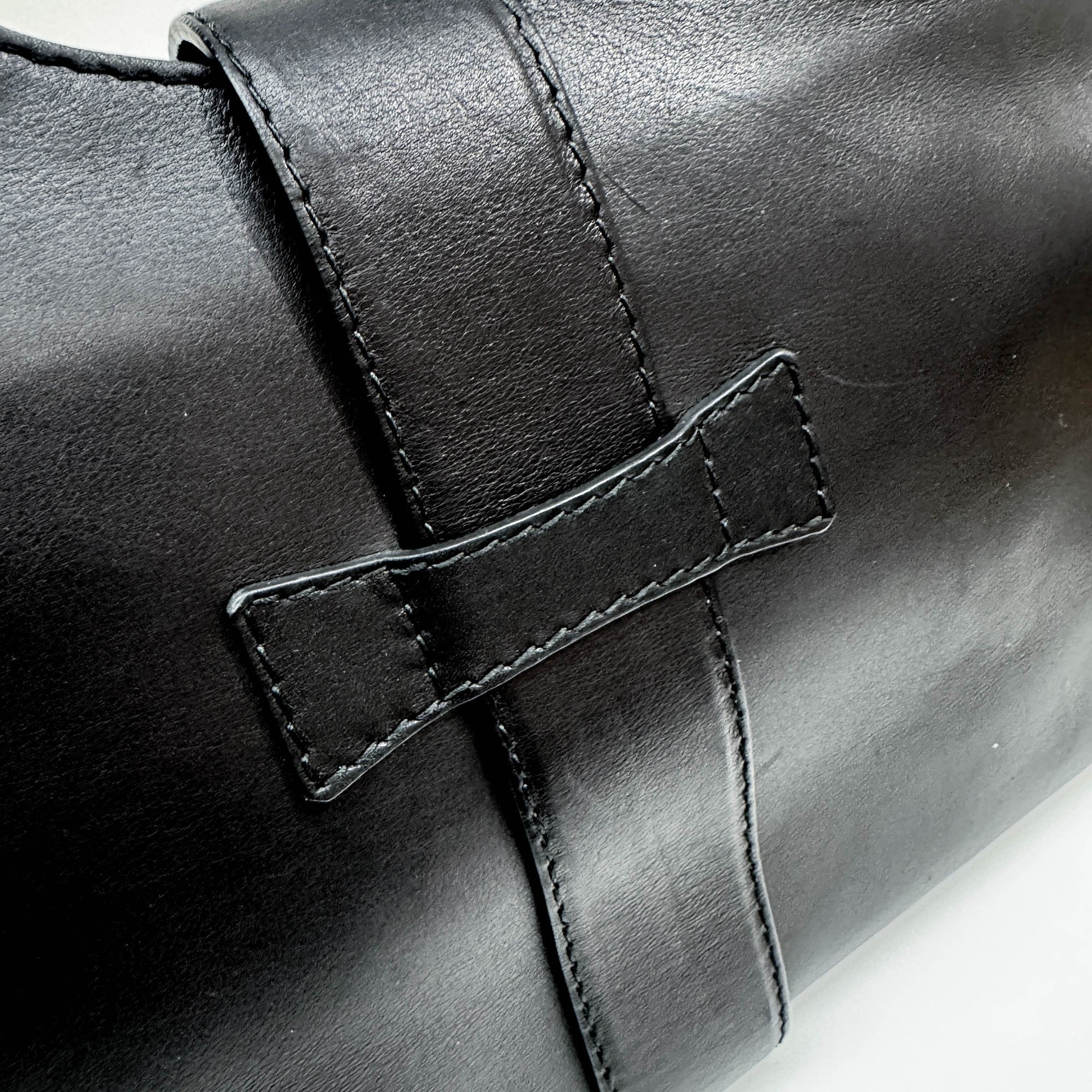 Stirrup Black Leather Hand Bag
