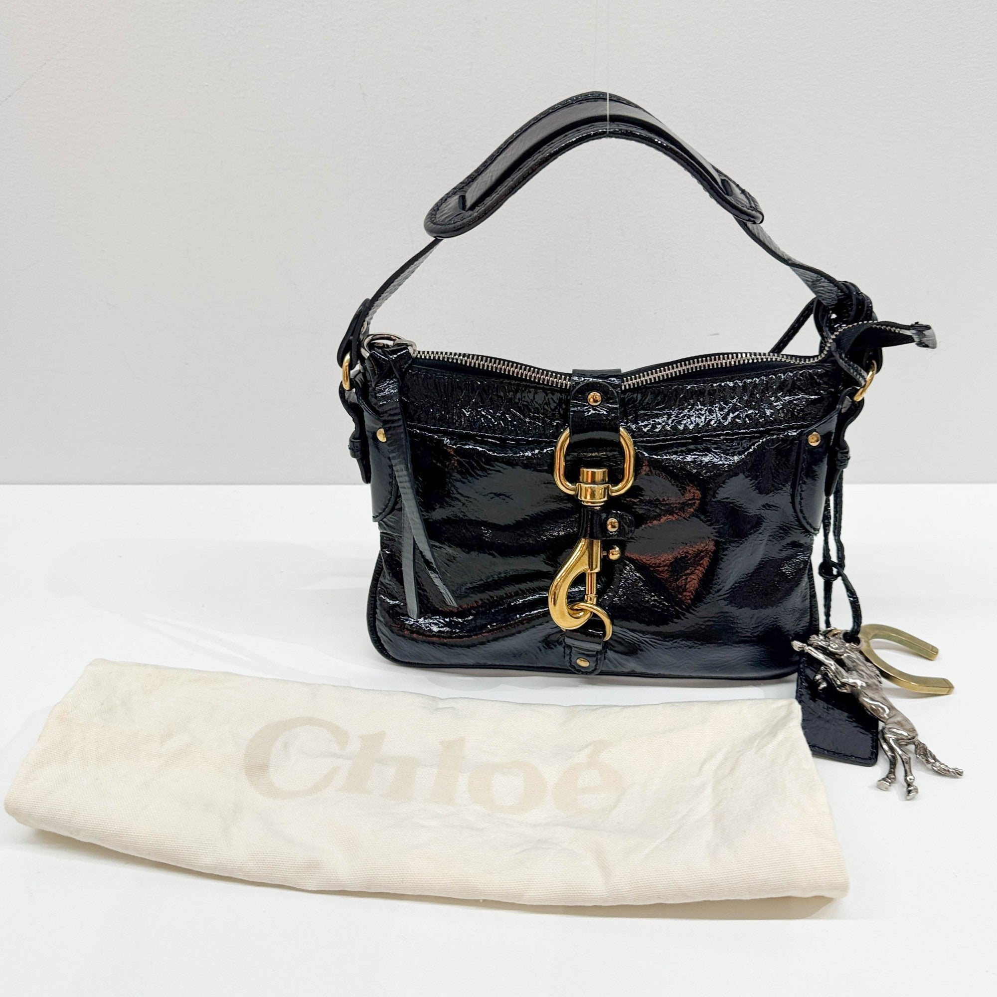 Kerala Black Patent Leather Hand Bag