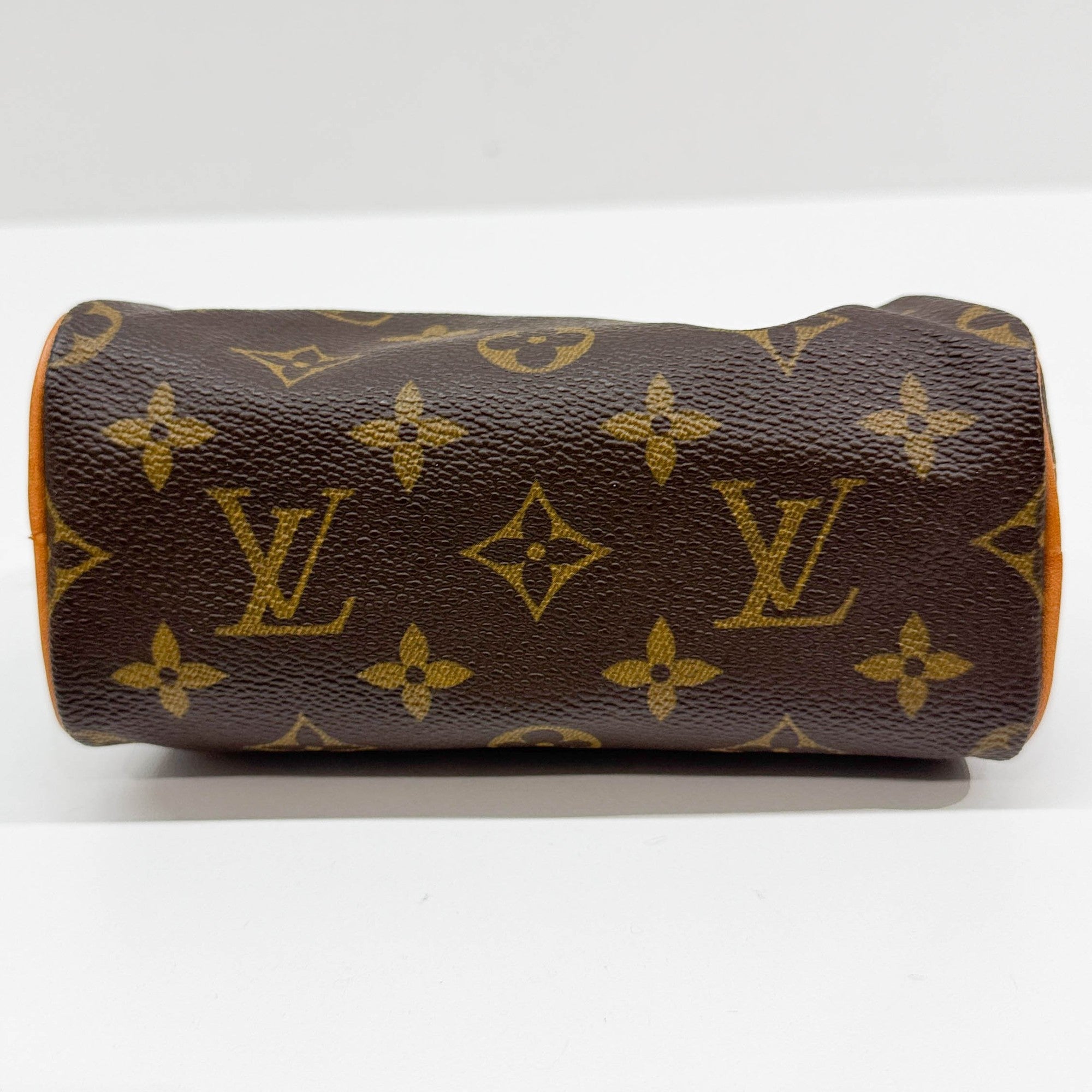 Mini Speedy Brown Monogram Leather Hand Bag